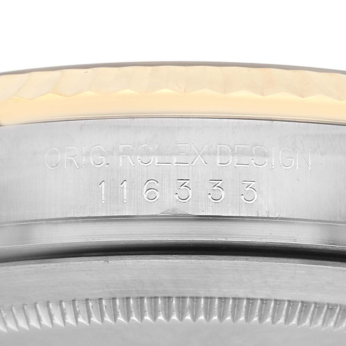 The image shows a close-up side view of the case side with the "ORIG. ROLEX DESIGN" engraving and reference number on the Rolex Datejust 41 116333 Men
s Steel and Gold (two tone) Champagne Dial 116333 Men
s Steel and Gold (two tone) Champagne Dial.