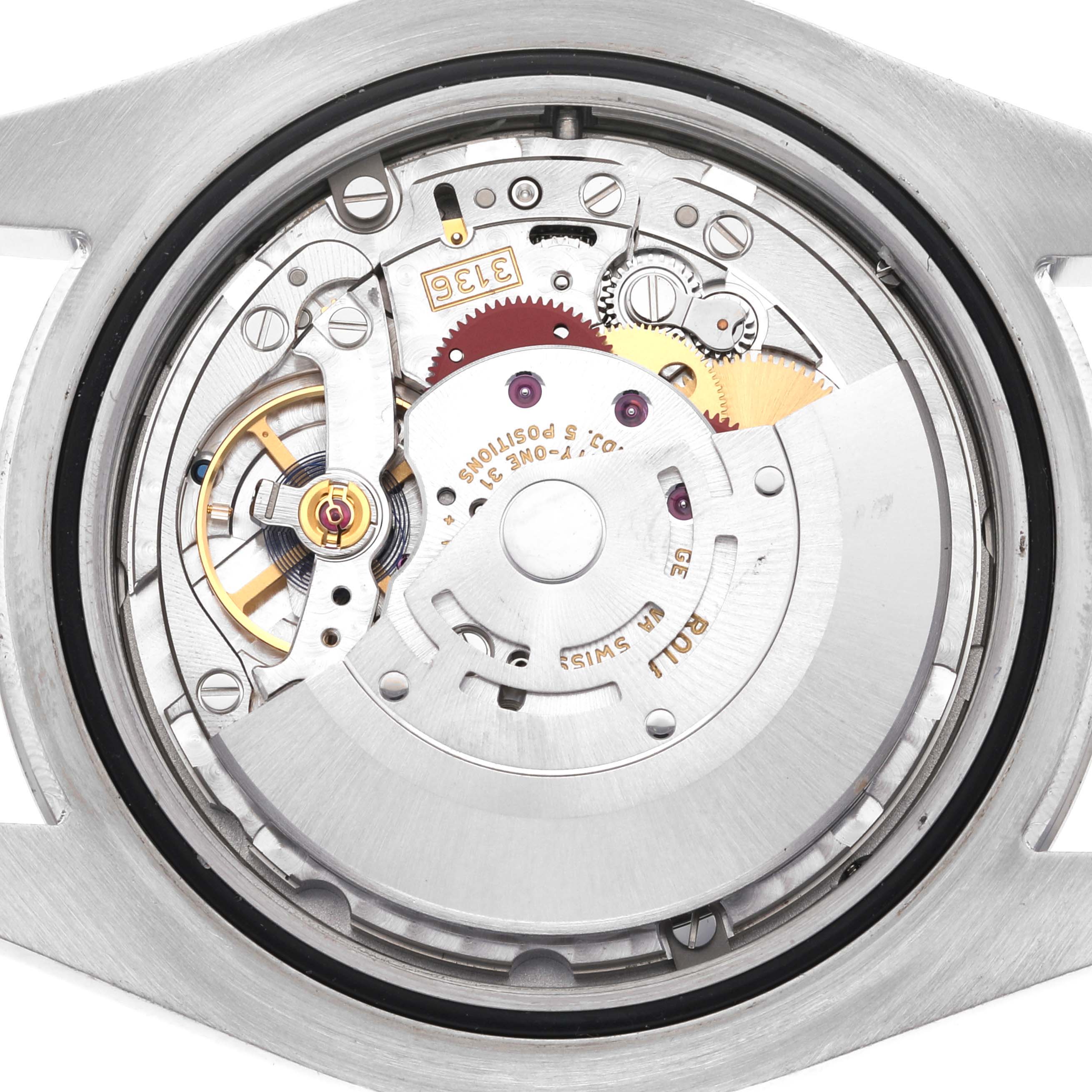 The image shows the internal mechanics and movement of the Rolex Datejust 41 116334 Men's Stainless Steel White Dial 116334 Men's Stainless Steel White Dial watch from a back view angle.