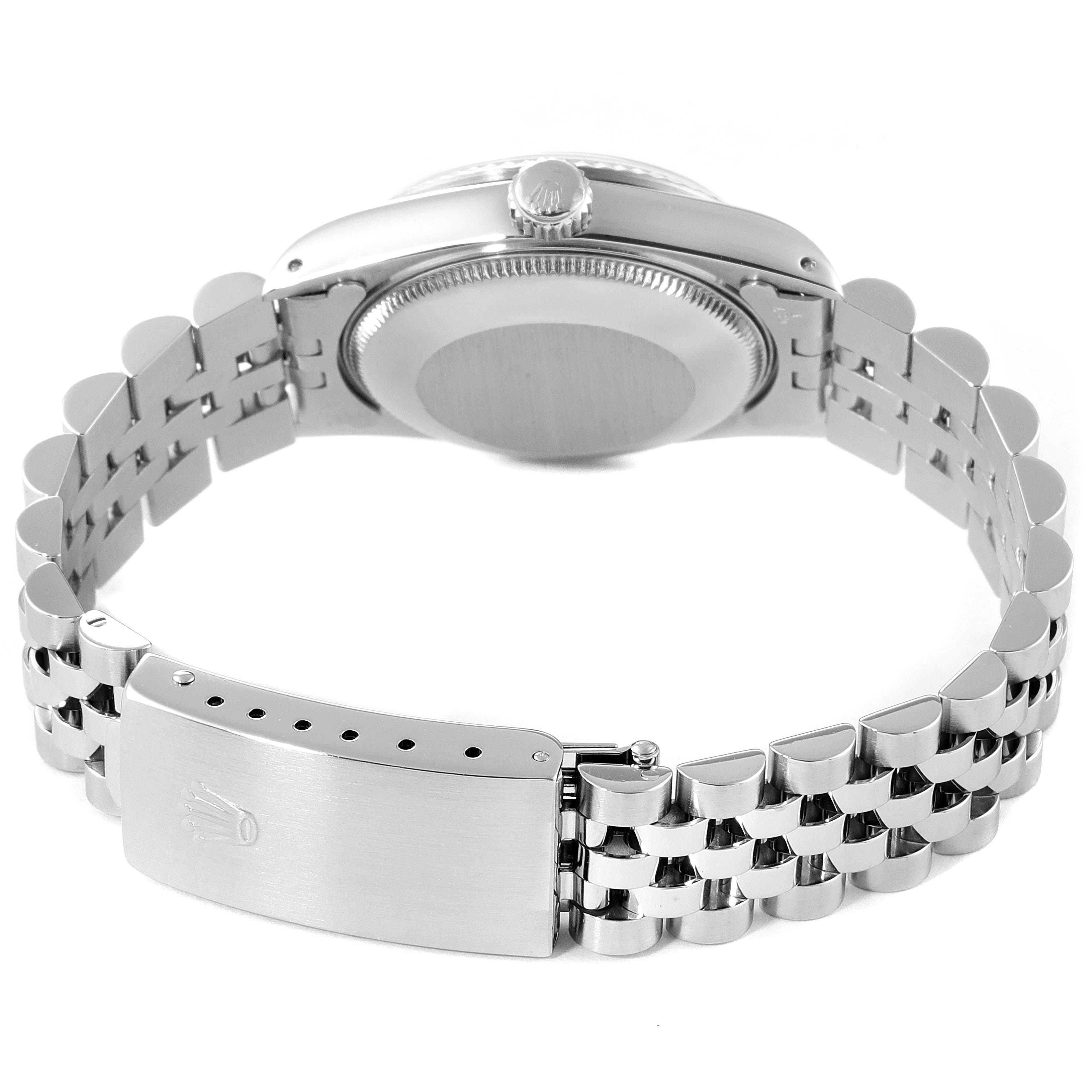 The image shows the back view of a Rolex Mid-Size 68274 Women
s Stainless Steel Silver Dial 68274 Women
s Stainless Steel Silver Dial watch, highlighting the case back, bracelet, and clasp.