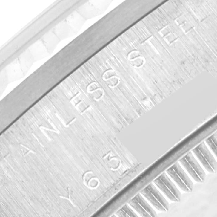 This close-up image of the Rolex Mid-Size 78274 Women's Stainless Steel Silver Dial 78274 Women's Stainless Steel Silver Dial model features the watch's stainless steel case and part of its fluted bezel.