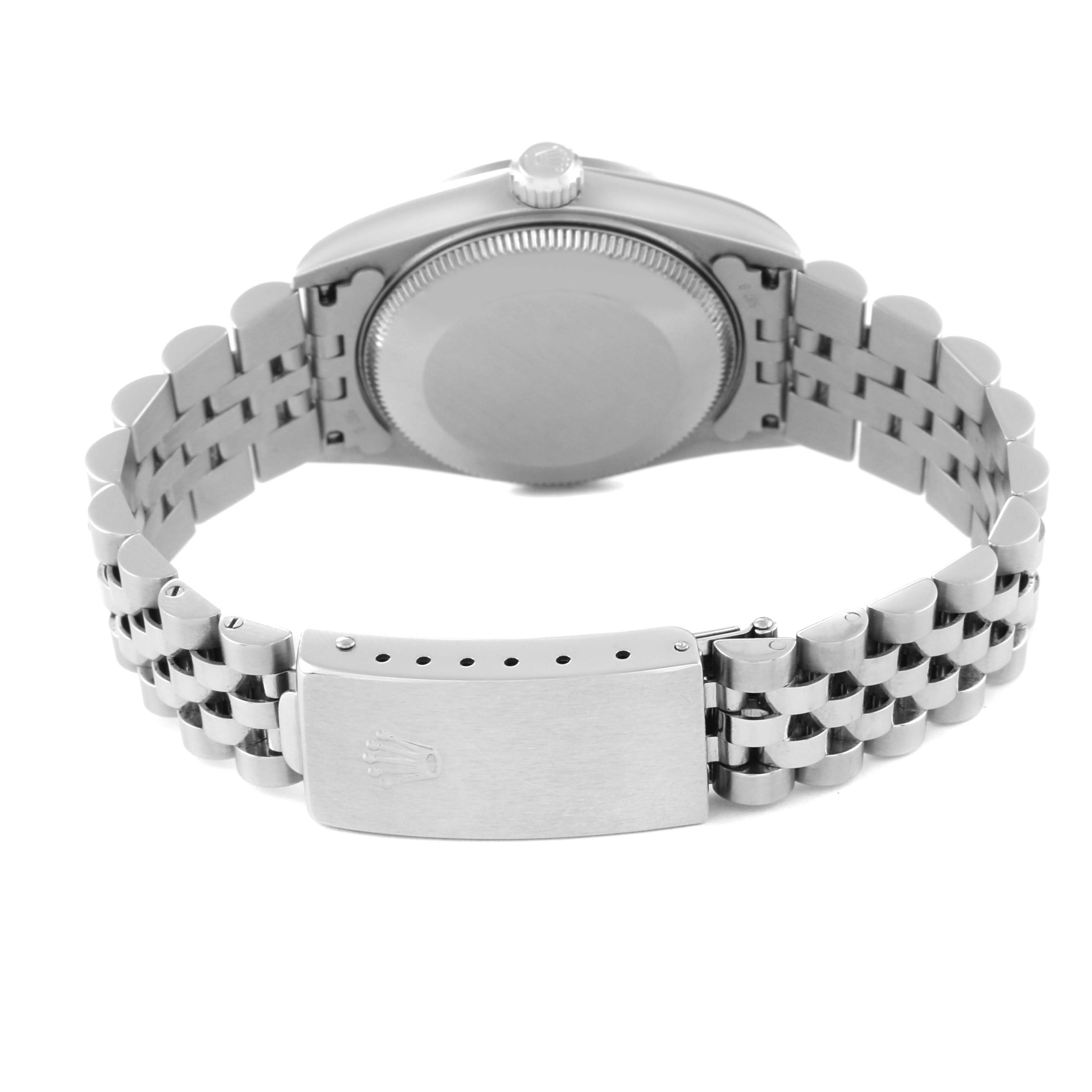 The image shows the back view of a Rolex Mid-Size 78274 Women's Stainless Steel Silver Dial 78274 Women's Stainless Steel Silver Dial watch, highlighting its case back and bracelet with the clasp.