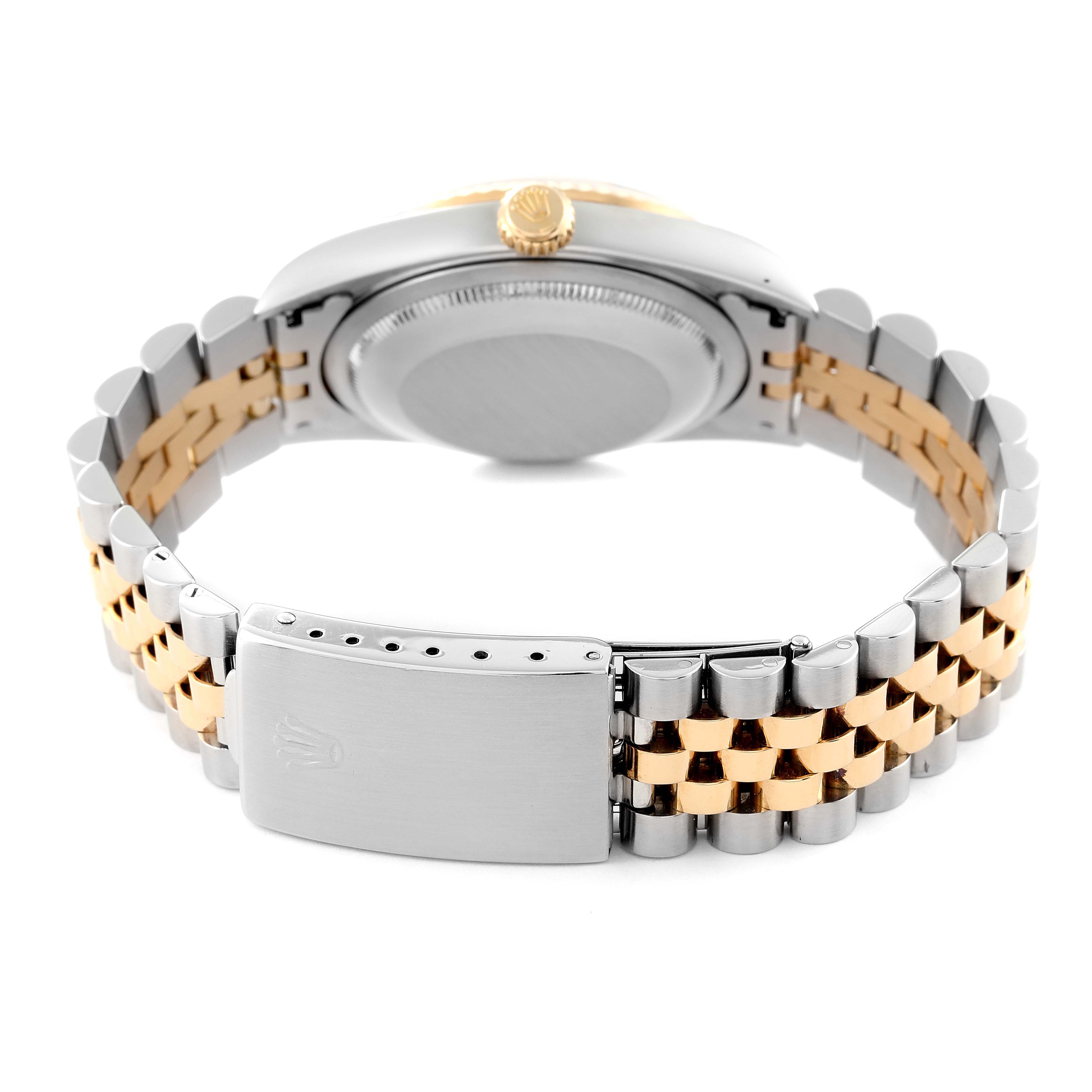 This image shows the back view of a Rolex Datejust 16233 Men's Steel and Gold (two tone) Black Dial 16233 Men's Steel and Gold (two tone) Black Dial watch, highlighting its caseback, bracelet, and clasp.