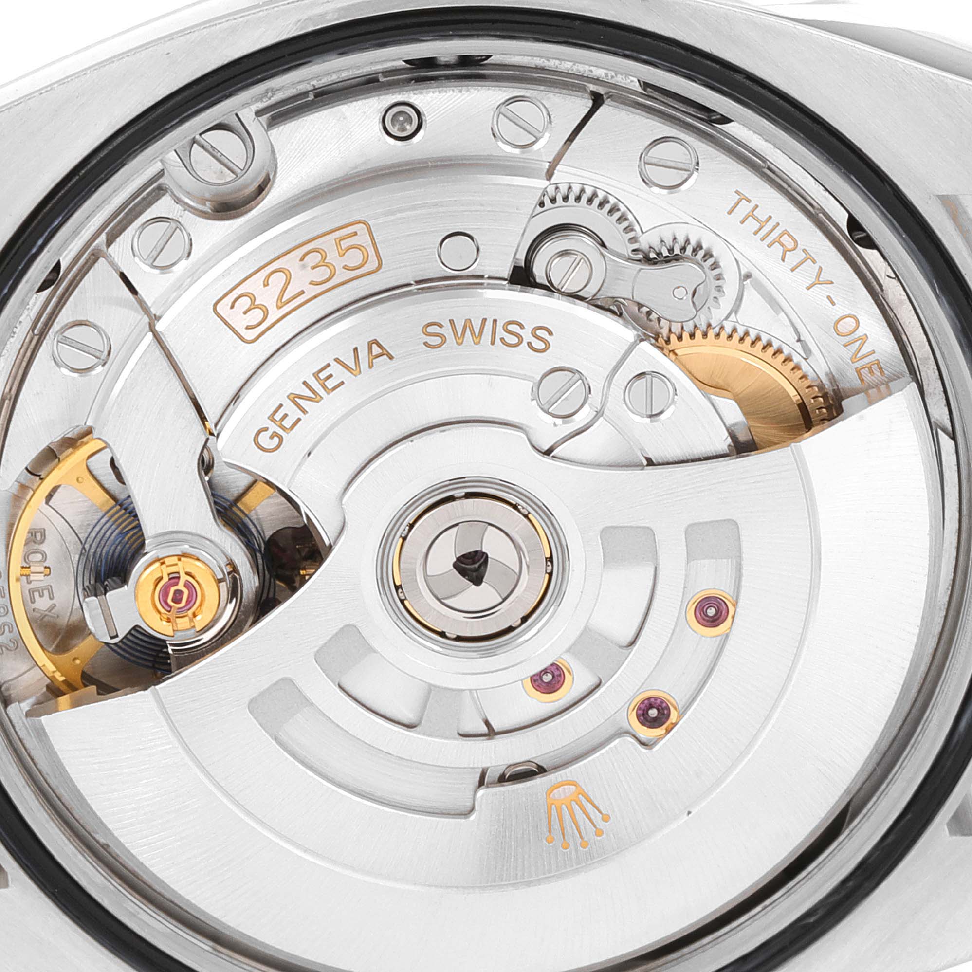 This image shows a close-up view of the movement mechanism inside a Rolex Datejust 126234 Men
s Stainless Steel Black Dial 126234 Men
s Stainless Steel Black Dial watch, including the rotor and gears.