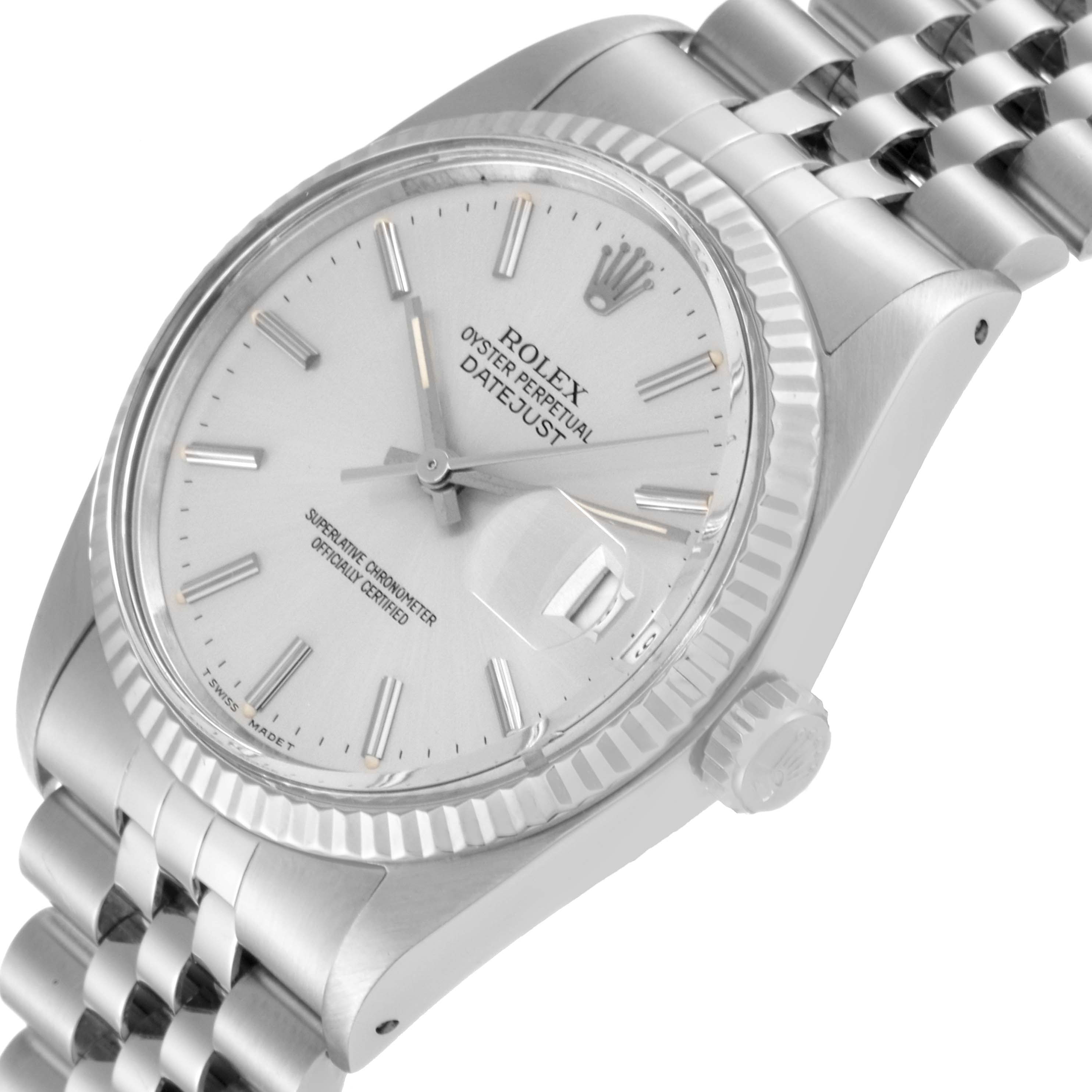 The image shows a side angle view of the Rolex Vintage Collection 16014 Men's Stainless Steel Silver Dial 16014 Men's Stainless Steel Silver Dial Datejust model, featuring the dial, crown, and part of the bracelet.