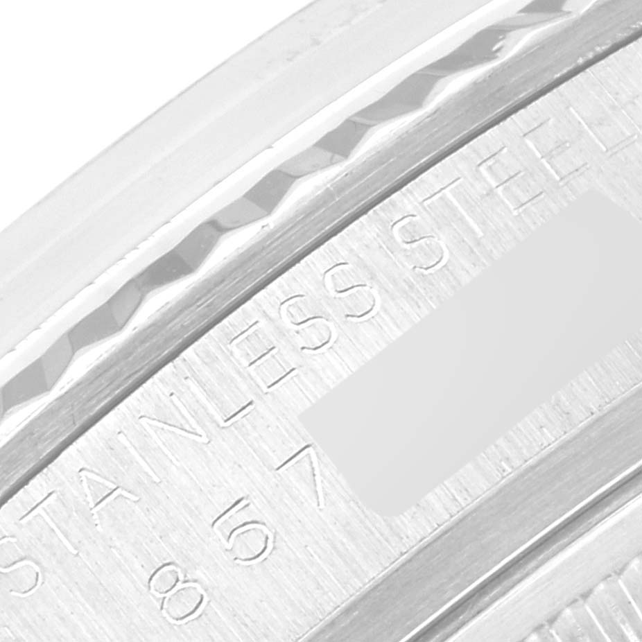 This close-up image shows the engraving on the stainless steel case of a Vintage Collection model watch by Rolex.