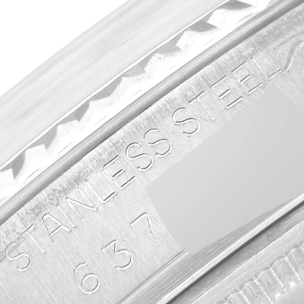 This close-up image shows the stainless steel engraving on the side of the Rolex Vintage Collection 16014 Men's Stainless Steel Silver Dial 16014 Men's Stainless Steel Silver Dial watch case.