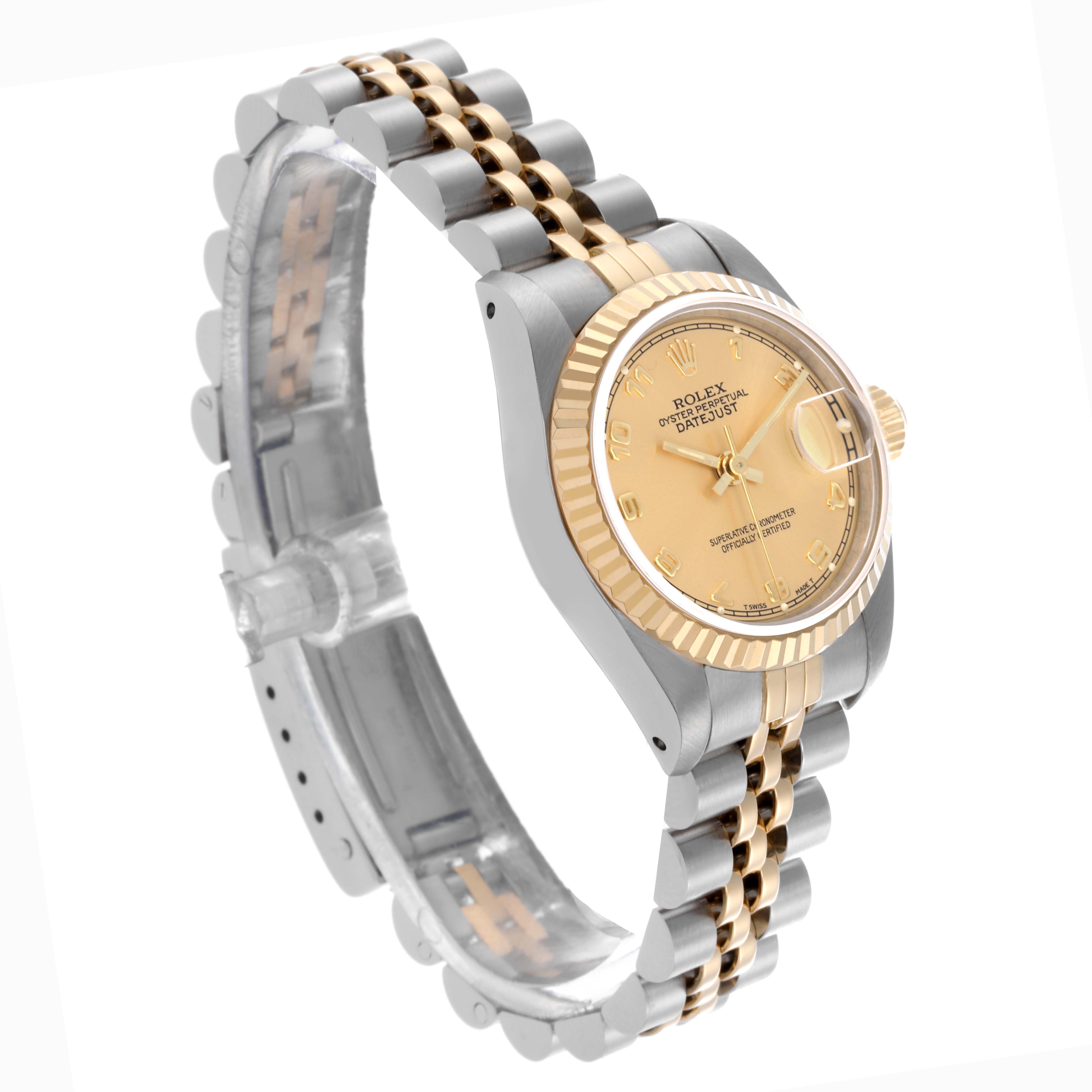 The Rolex Datejust 69173 Women's Steel and Gold (two tone) Champagne Dial 69173 Women's Steel and Gold (two tone) Champagne Dial watch is shown at a slight angle, displaying its gold and silver case, bezel, dial, and two-tone bracelet.