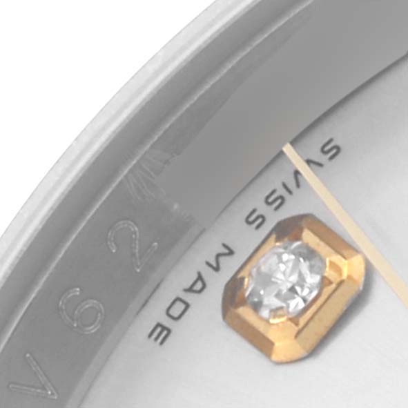 The image shows a close-up angle of a Rolex Datejust 116233 Men's Steel and Gold (two tone) Silver Dial 116233 Men's Steel and Gold (two tone) Silver Dial, highlighting the bezel, diamond marker, and "SWISS MADE" text.