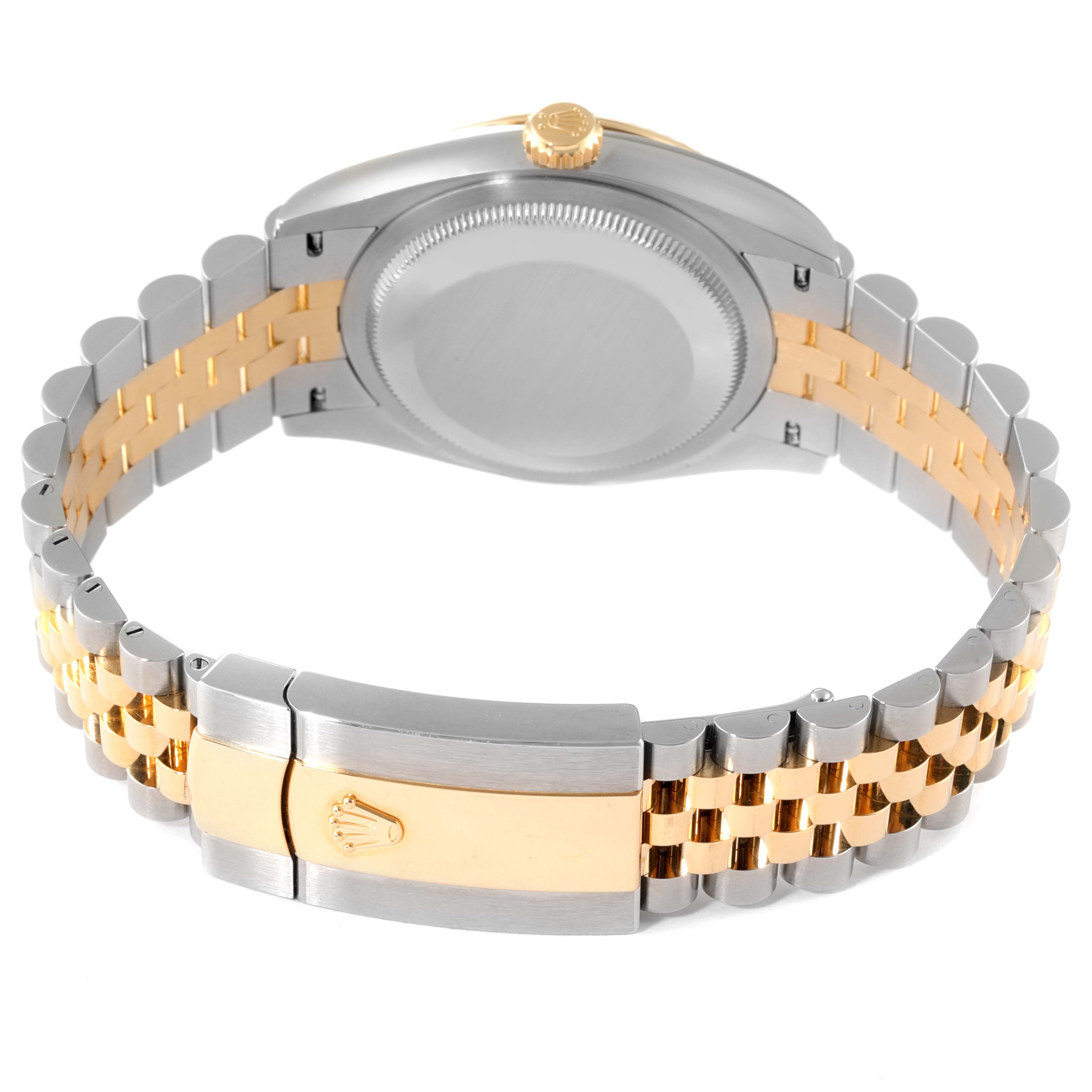 The image shows the back case and bracelet of a Rolex Datejust 126233 Men's Steel and Gold (two tone) Champagne Dial 126233 Men's Steel and Gold (two tone) Champagne Dial watch in a two-tone stainless steel and gold design.