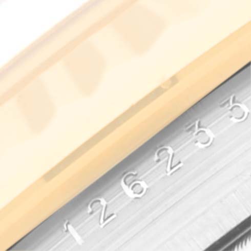 The image shows the date magnifier and a portion of the date wheel on a Rolex Datejust 126233 Men's Steel and Gold (two tone) Green Dial 126233 Men's Steel and Gold (two tone) Green Dial watch, viewed at an angle.