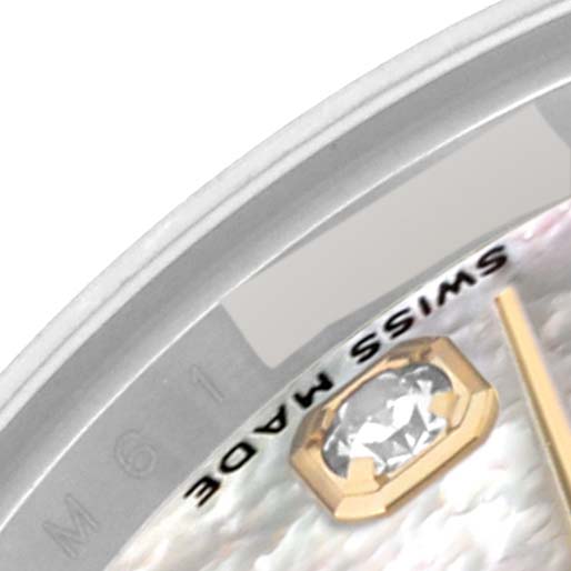 This close-up image shows the dial's edge, part of a diamond marker, and the "Swiss Made" text on a Rolex Datejust 179173 Women's Steel and Gold (two tone) Mother of Pearl Dial 179173 Women's Steel and Gold (two tone) Mother of Pearl Dial watch.