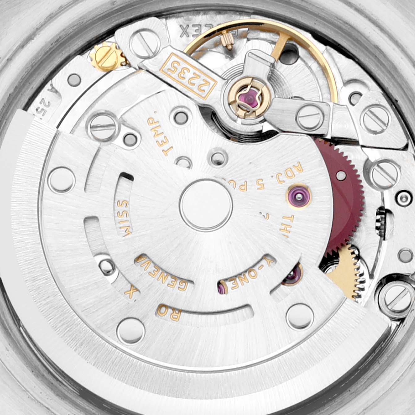 This image shows the intricate mechanical movement of a Rolex Datejust 179173 Women's Steel and Gold (two tone) Mother of Pearl Dial 179173 Women's Steel and Gold (two tone) Mother of Pearl Dial watch from a macro angle.
