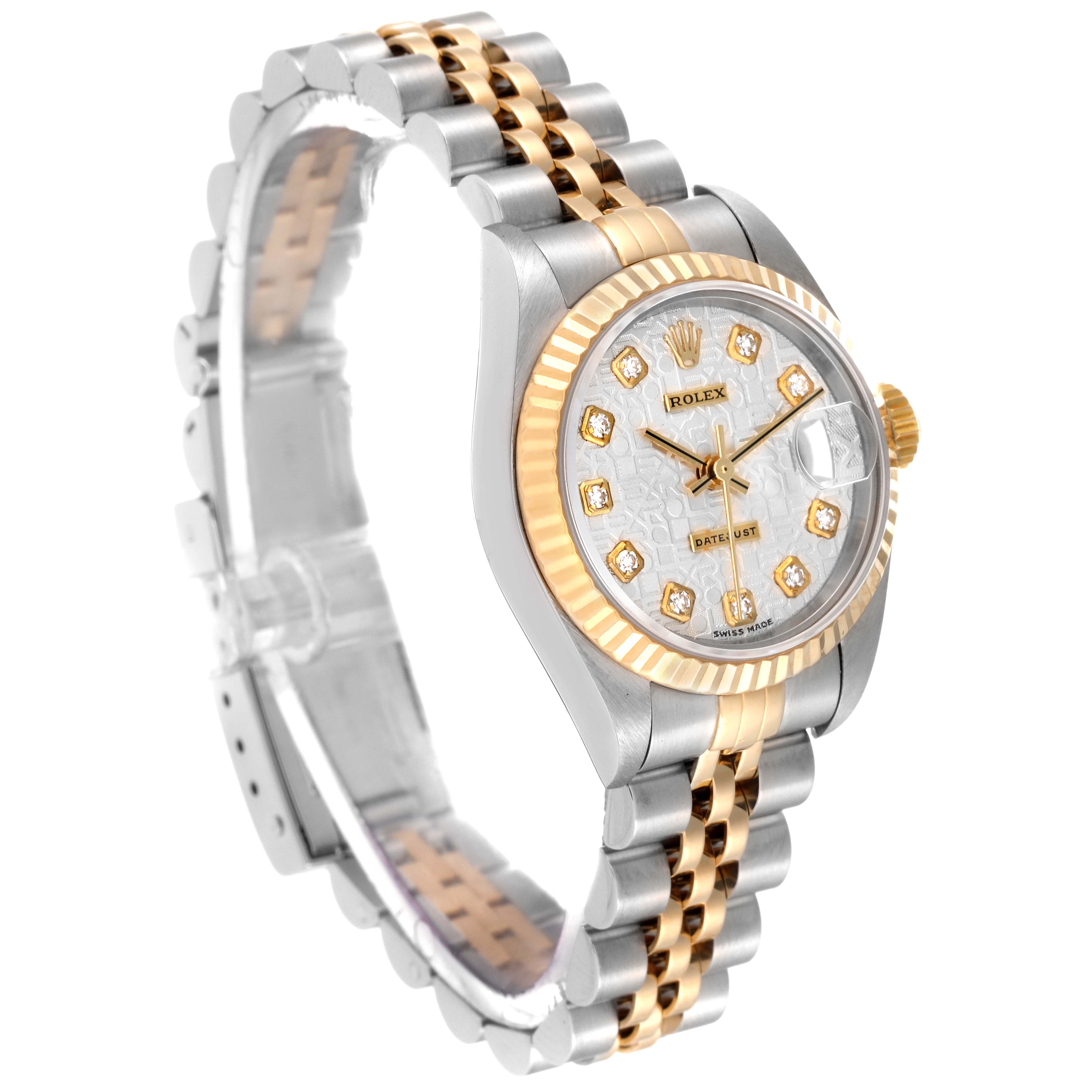 The Rolex Datejust 79173 Women's Steel and Gold (two tone) Silver Dial 79173 Women's Steel and Gold (two tone) Silver Dial watch is shown at an angle showcasing its face, bracelet, and bezel.