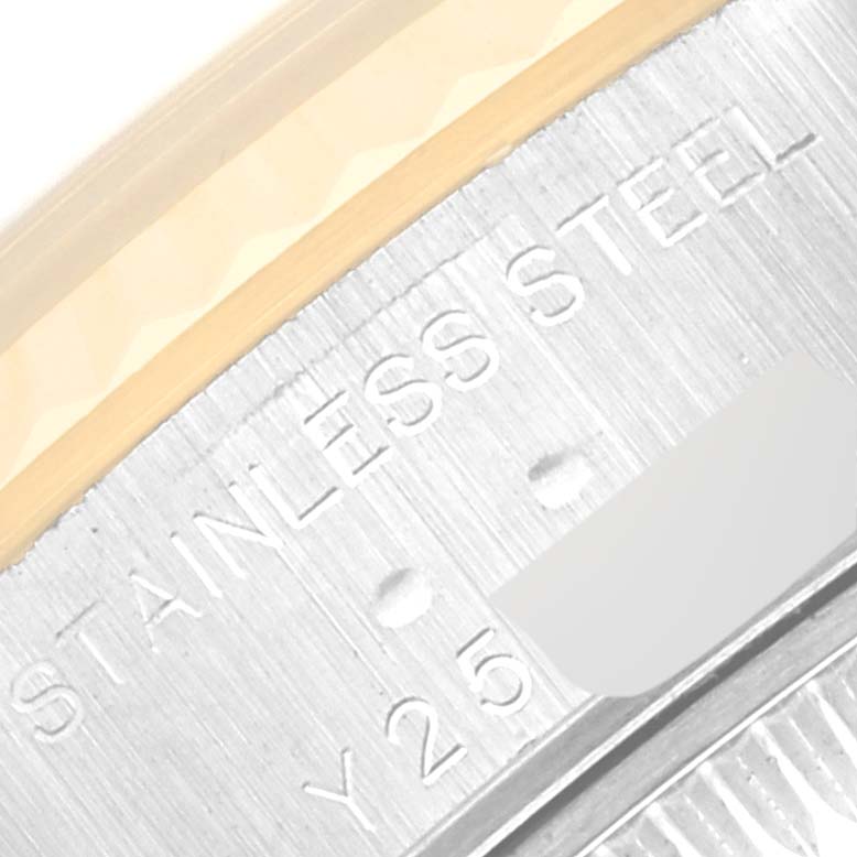 This close-up image shows the engraved stainless steel detail on the bezel of a Rolex Datejust 79173 Women's Steel and Gold (two tone) Grey Dial 79173 Women's Steel and Gold (two tone) Grey Dial watch.