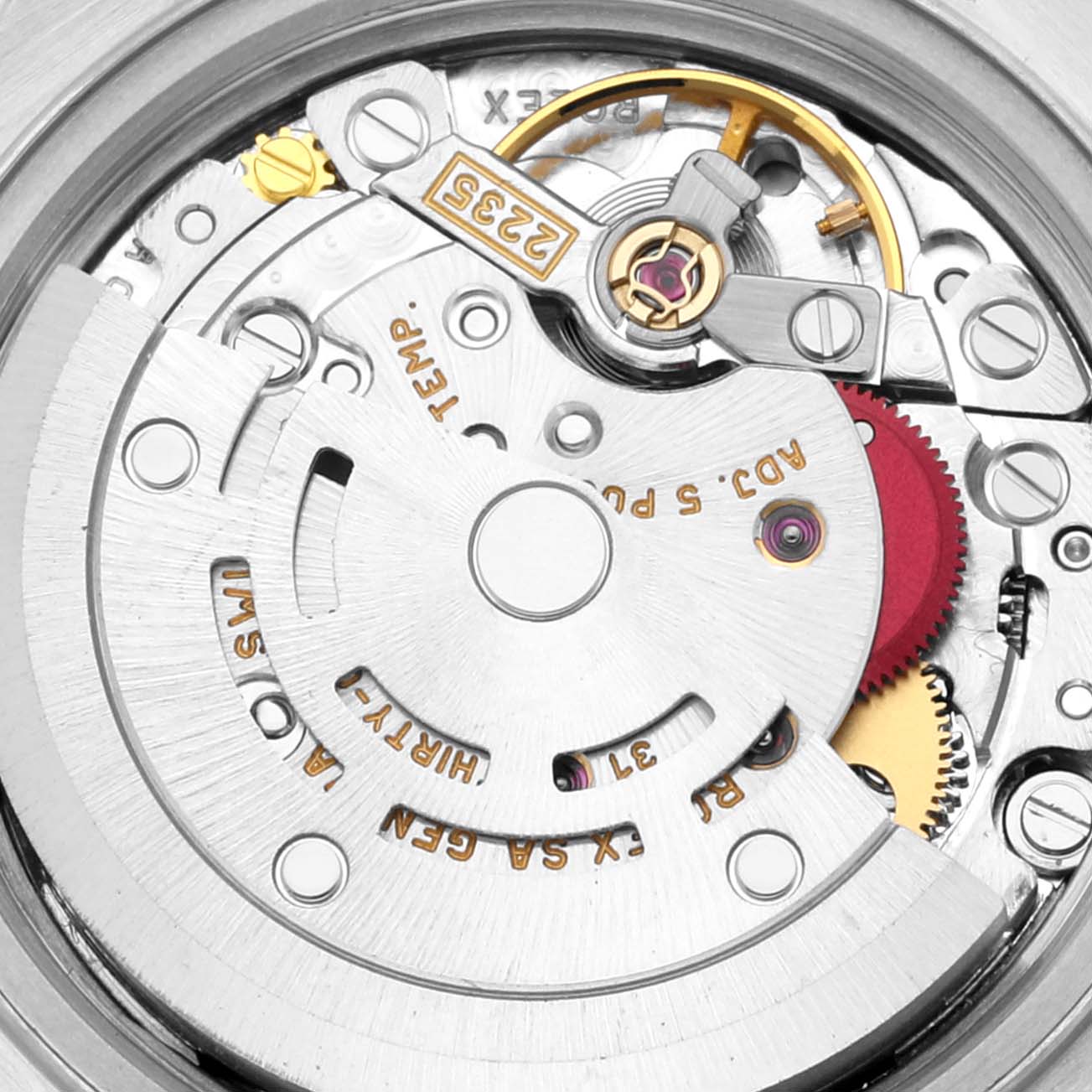 This is a close-up view of the Rolex Datejust 79173 Women's Steel and Gold (two tone) Grey Dial 79173 Women's Steel and Gold (two tone) Grey Dial's movement, showing gears and intricate internal mechanisms.