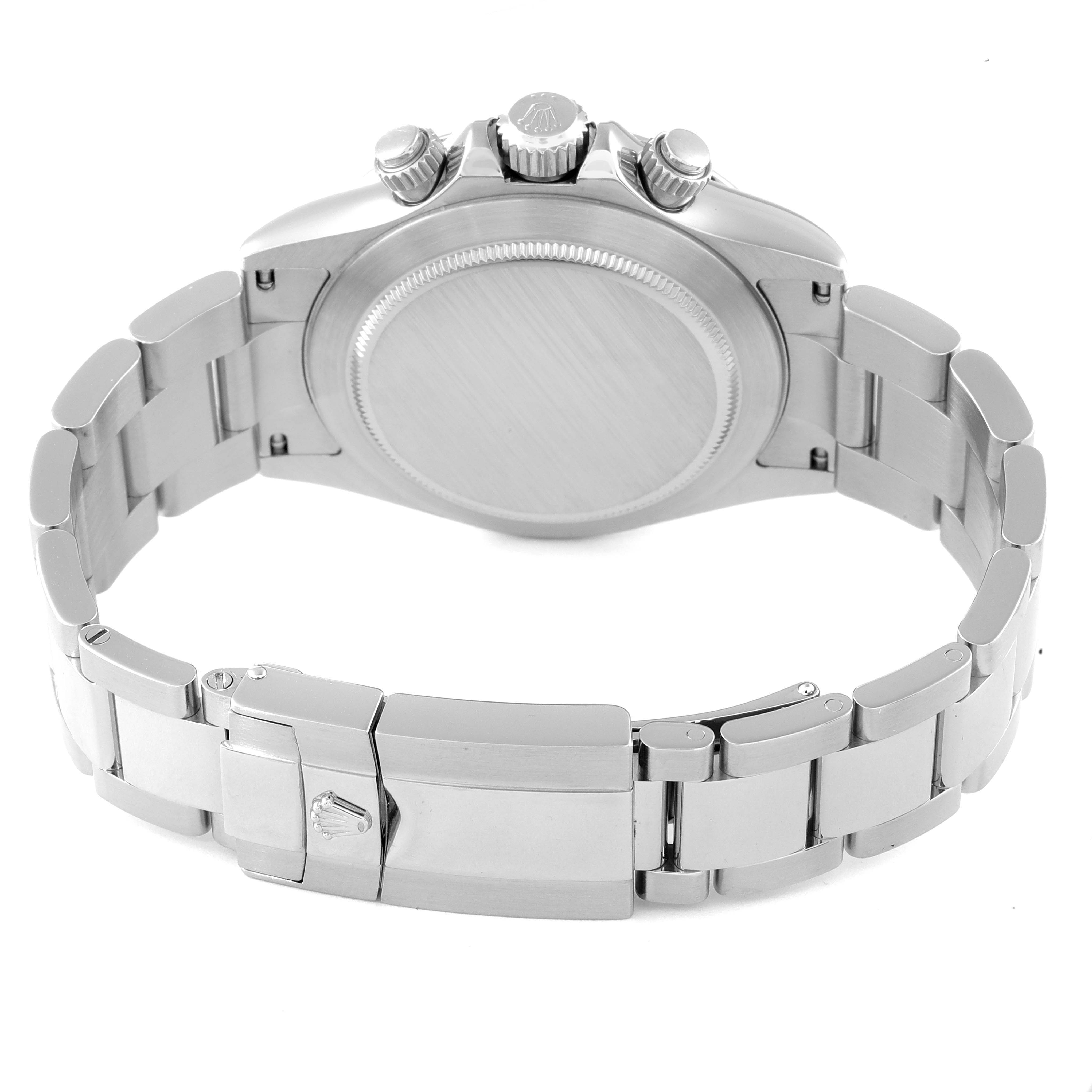 The image shows the back view of a Rolex Daytona 116520 Men's Stainless Steel Black Dial 116520 Men's Stainless Steel Black Dial watch, highlighting the case, crown, chronograph pushers, and the bracelet with clasp.