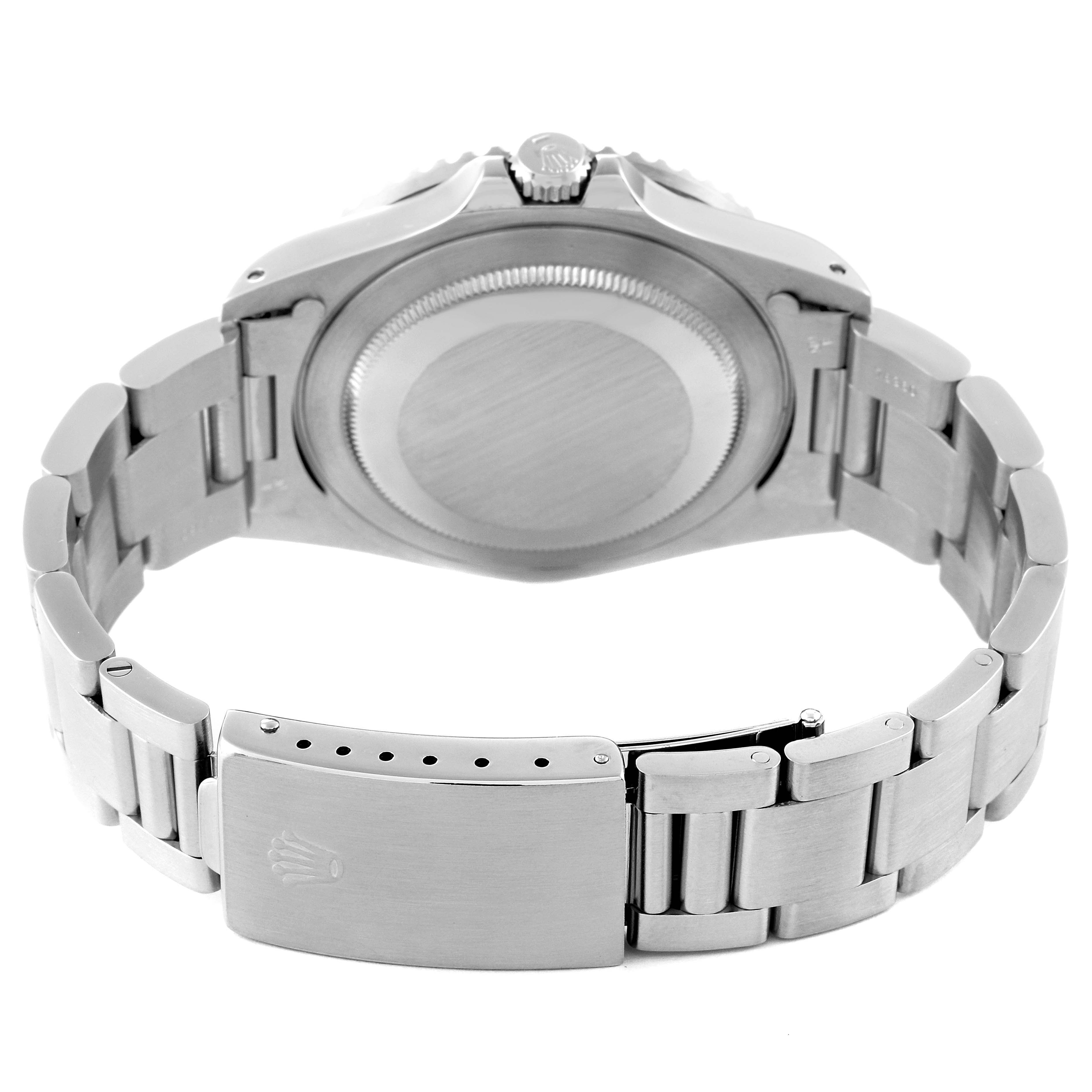 The image shows the back of a Rolex GMT-Master 16700 Men
s Stainless Steel Black Dial 16700 Men
s Stainless Steel Black Dial watch, including the case back and bracelet with the clasp open.