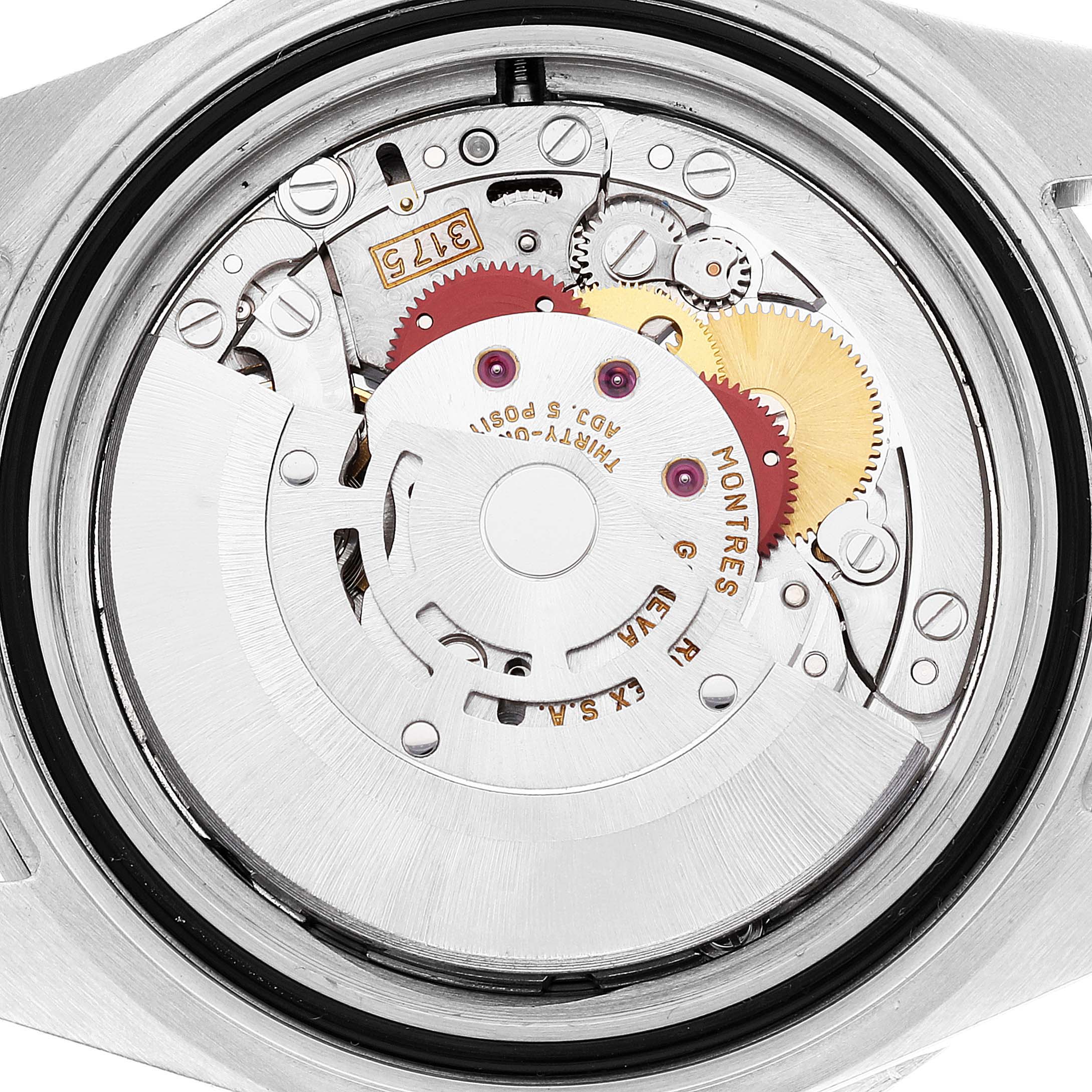 This image shows a close-up of the inner mechanical movement of a Rolex GMT-Master 16700 Men
s Stainless Steel Black Dial 16700 Men
s Stainless Steel Black Dial watch.