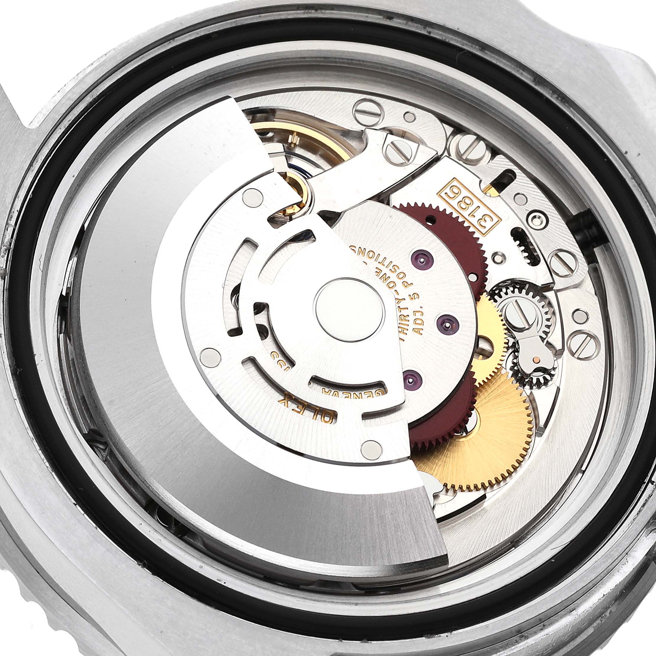 This image shows the intricate movement parts of the Rolex GMT-Master 116710 Men's Stainless Steel Black Dial 116710 Men's Stainless Steel Black Dial watch from a top-down internal angle.