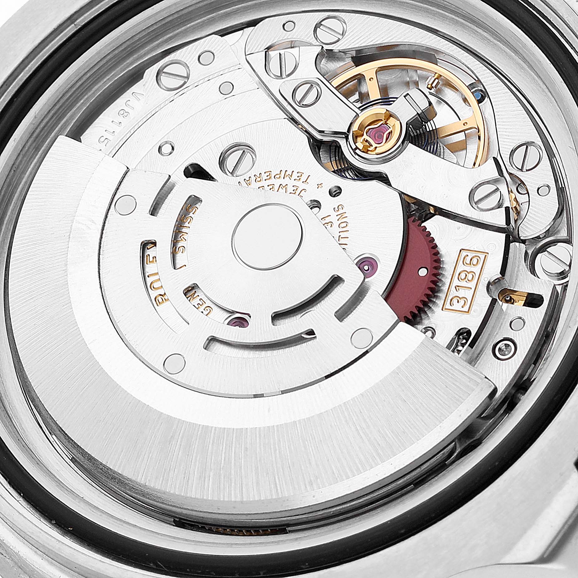 This image showcases a close-up of the movement mechanism inside a Rolex GMT-Master 116710 Men's Stainless Steel Black Dial 116710 Men's Stainless Steel Black Dial watch.