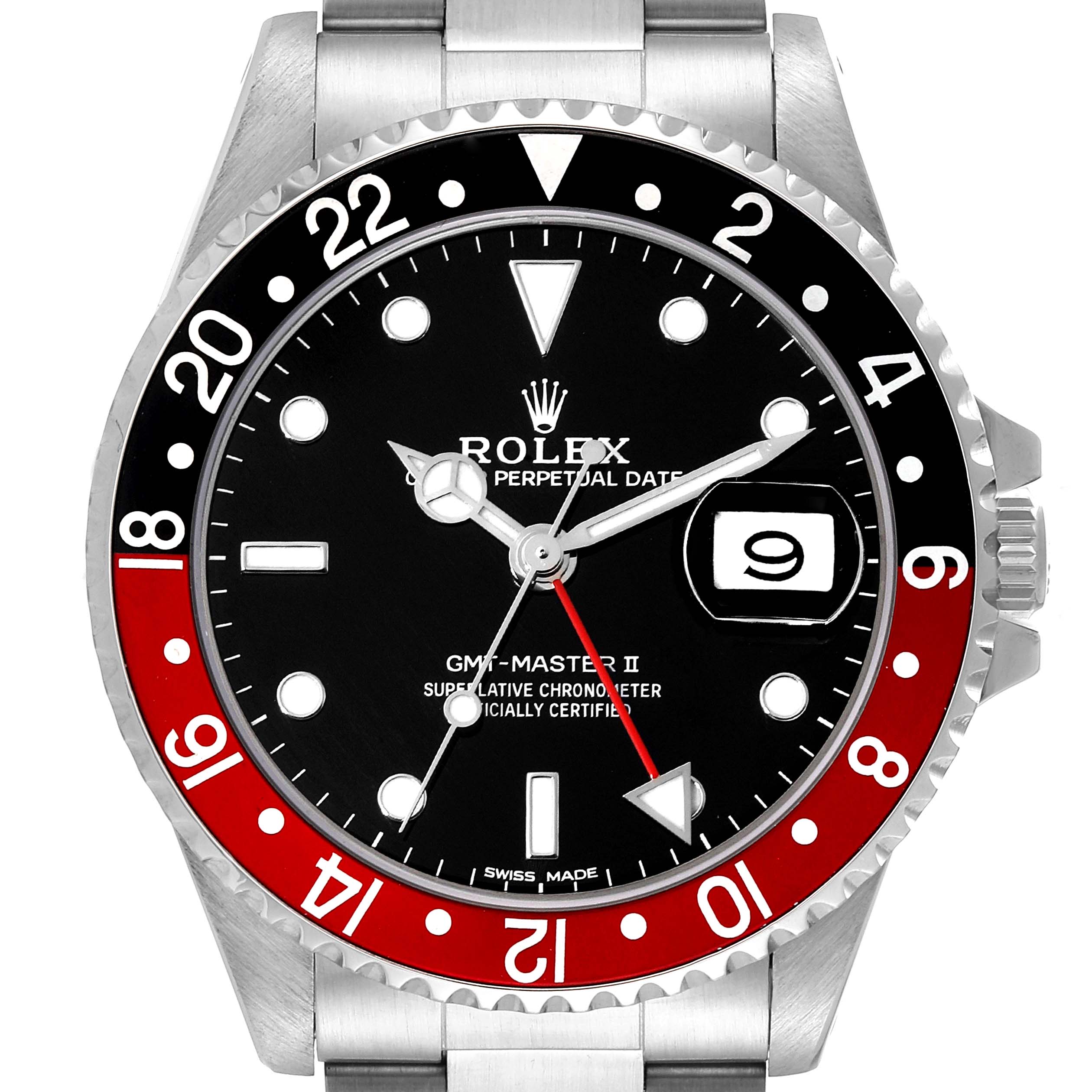The image shows the face of a Rolex GMT-Master 16710 Men
s Stainless Steel Black Dial 16710 Men
s Stainless Steel Black Dial II watch from a front angle, highlighting the bezel, dial, and date window.