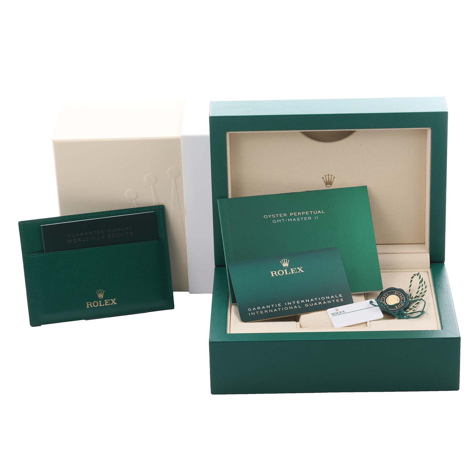 The image shows a Rolex GMT-Master 126710BLRO Men's Stainless Steel Black Dial 126710BLRO Men's Stainless Steel Black Dial watch box including the guarantee manual, international warranty, and tags.