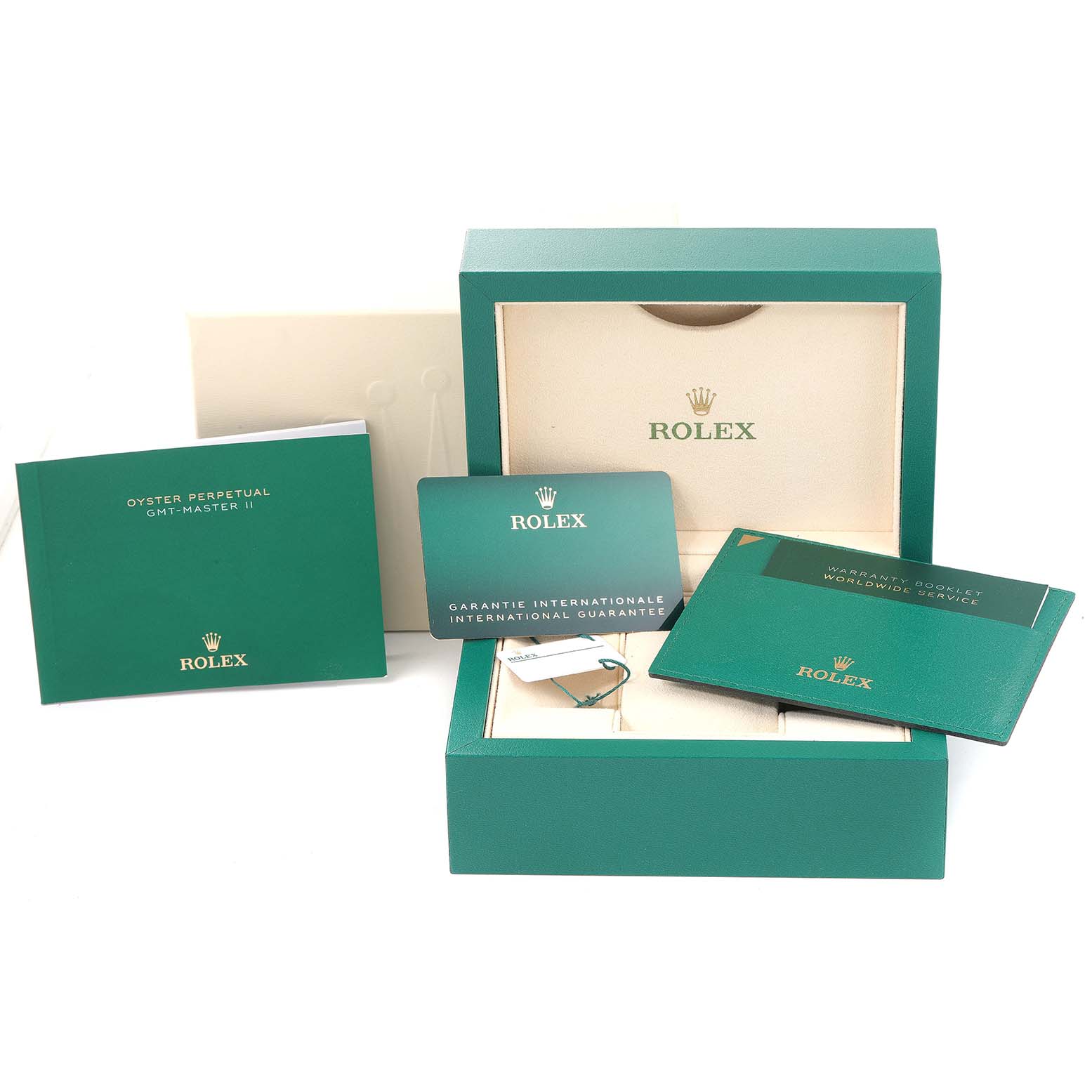 This image shows the packaging and accessories for a Rolex GMT-Master 126710 Men
s Stainless Steel Black Dial 126710 Men
s Stainless Steel Black Dial watch, including the box, warranty card, and manuals.