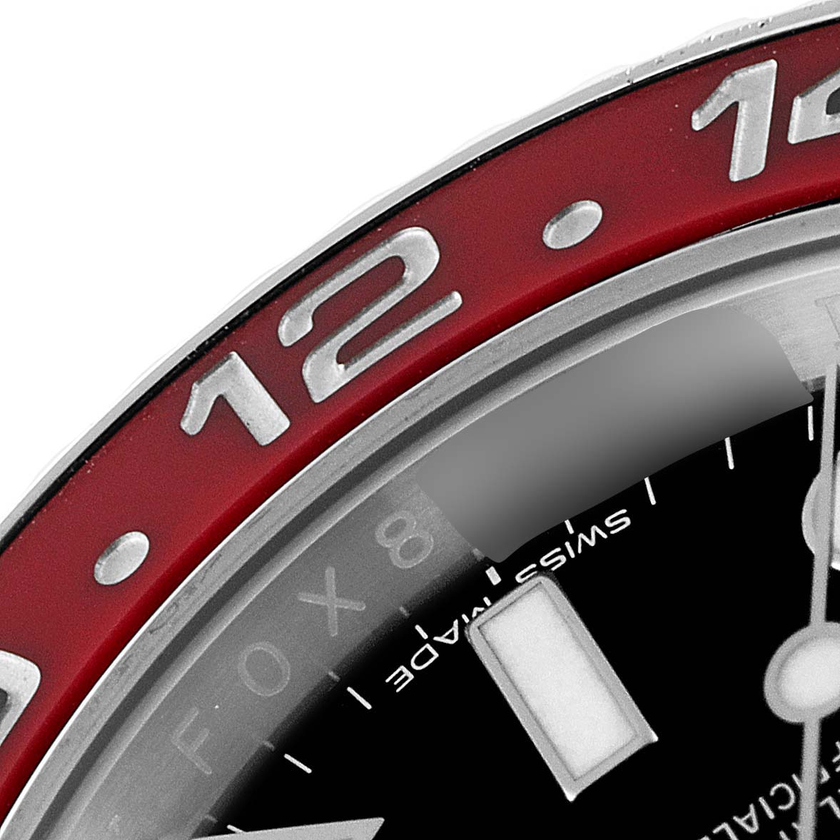 This image shows a close-up of the bezel and part of the dial on the Rolex GMT-Master 116719 Men's White Gold Black Dial 116719 Men's White Gold Black Dial watch.