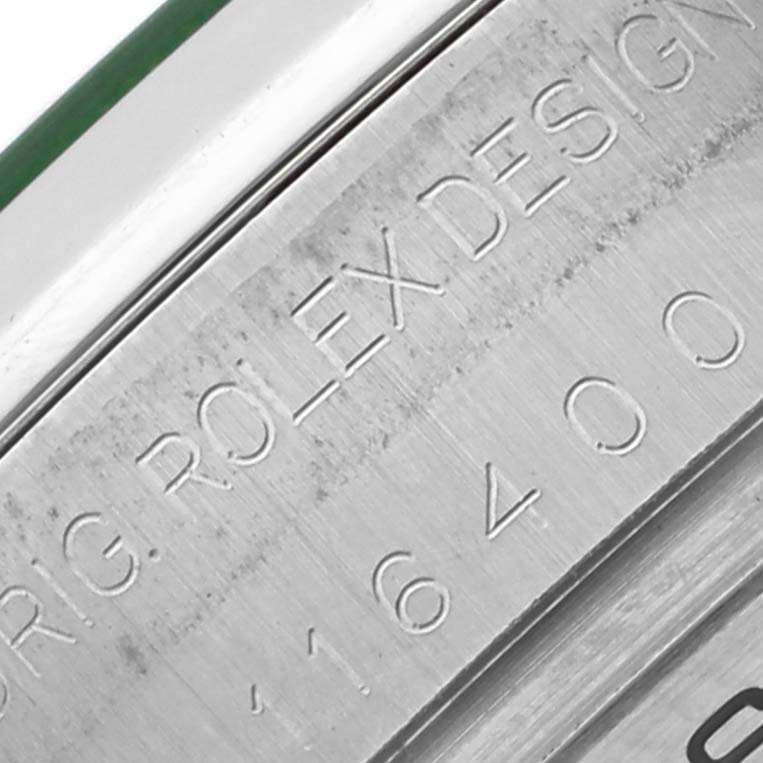 The image shows a close-up of the Rolex Milgauss 116400GV Men's Stainless Steel Black Dial 116400GV Men's Stainless Steel Black Dial model's engraved case back with model details visible.