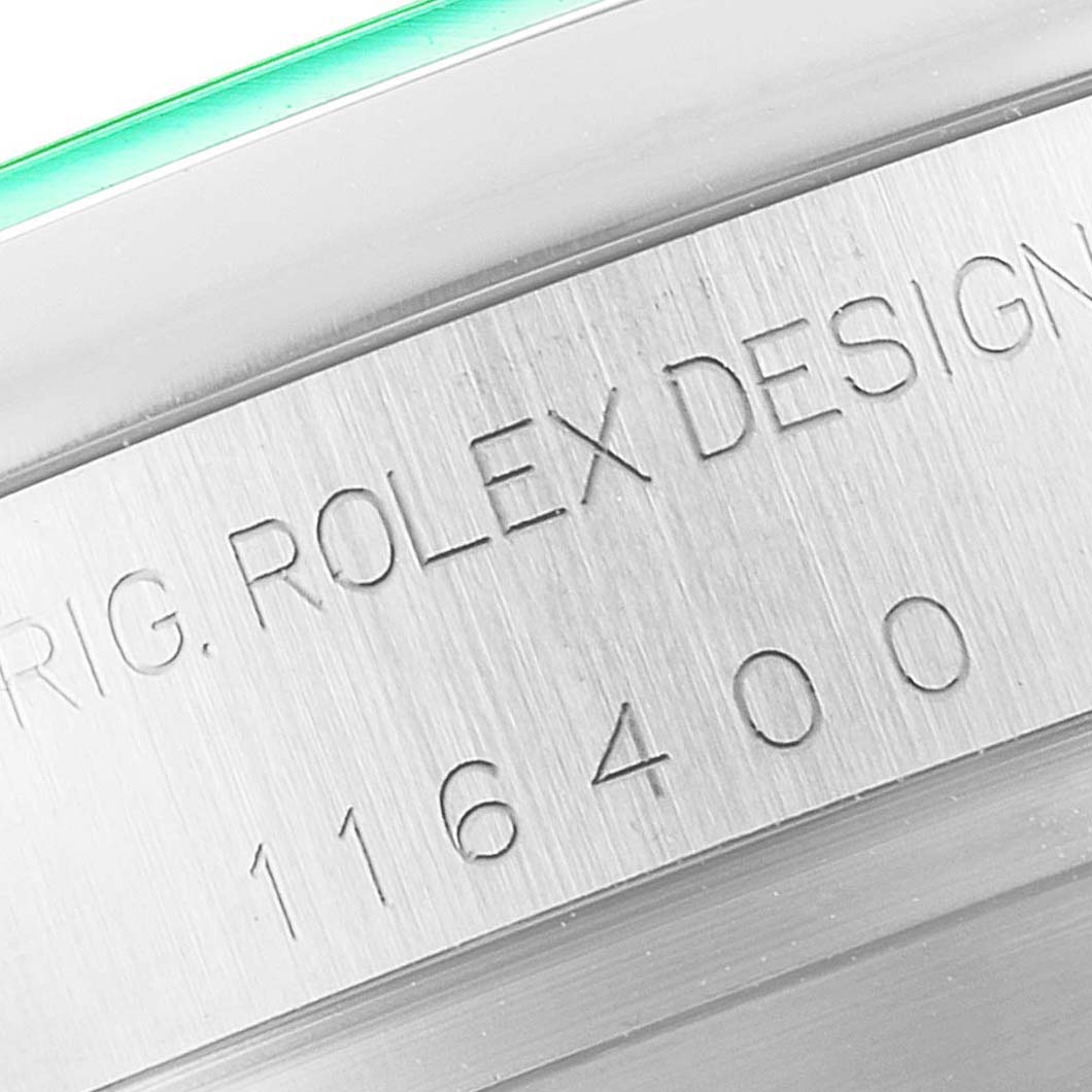 The image shows a close-up of the engraved inner bezel of a Rolex Milgauss 116400GV Men's Stainless Steel Blue Dial 116400GV Men's Stainless Steel Blue Dial watch with the model number 116400.