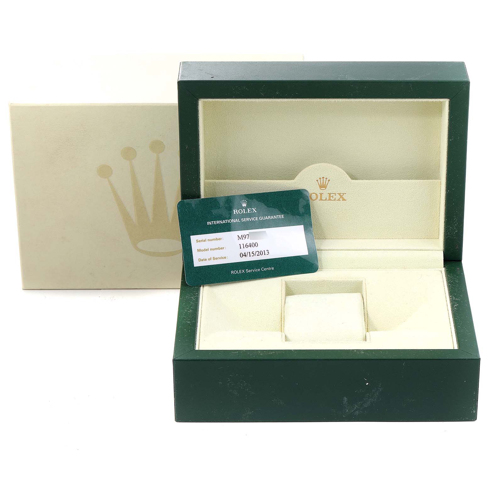 The image shows an open Rolex watch box for the Milgauss model, along with a service guarantee card.