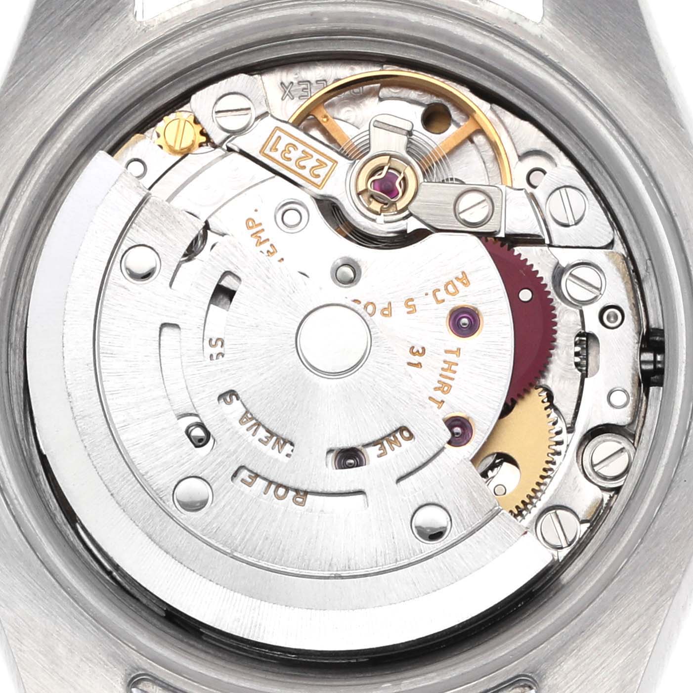 The image shows the inner mechanics of a Rolex Oyster Perpetual 176200 Women's Stainless Steel Black Dial 176200 Women's Stainless Steel Black Dial watch from a rear angle, displaying gears and rotors.