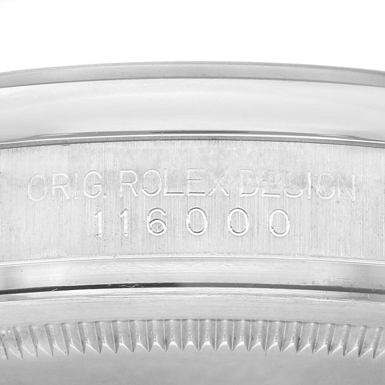 The image shows the side of the bezel with "ORIG. ROLEX DESIGN 116000" engraved on a Rolex Oyster Perpetual 116000 Men's Stainless Steel Black Dial 116000 Men's Stainless Steel Black Dial.