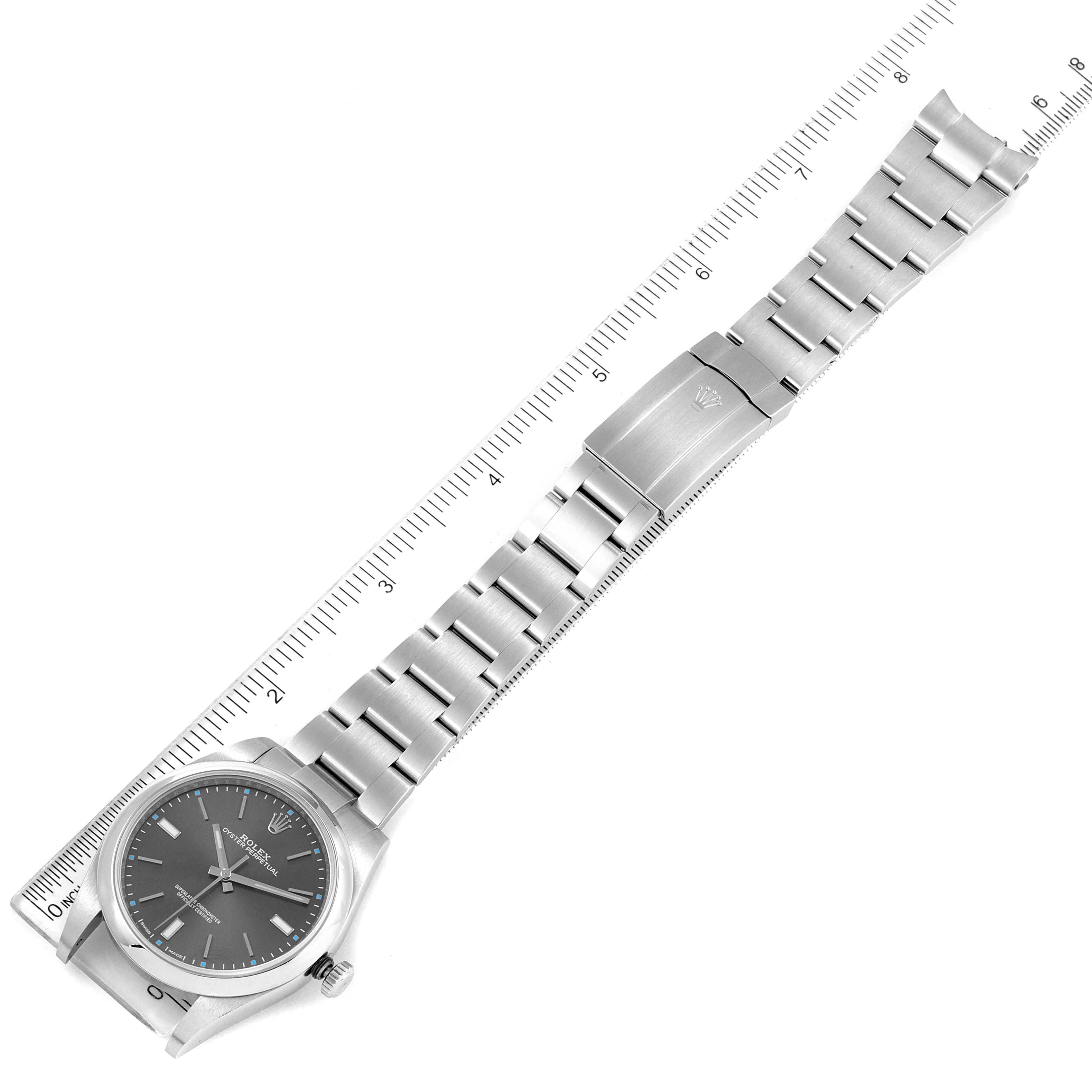 The image shows the Rolex Oyster Perpetual 114300 Men's Stainless Steel Grey Dial 114300 Men's Stainless Steel Grey Dial watch laid out flat, showcasing the face, bracelet, and clasp.