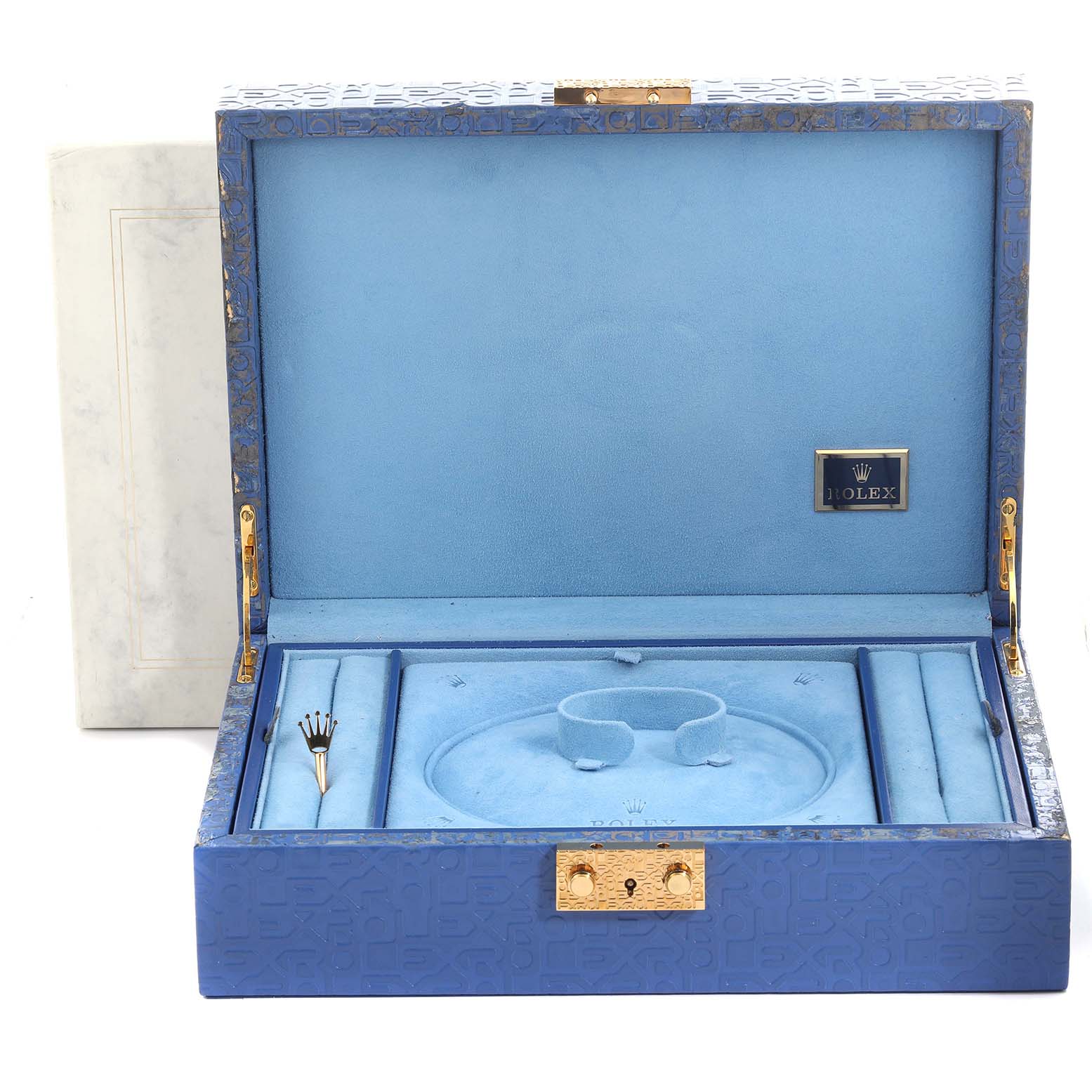 The image shows an open blue Rolex Pearlmaster 69298 Women's Yellow Gold Champagne Dial 69298 Women's Yellow Gold Champagne Dial watch box with interior compartments and branding elements.