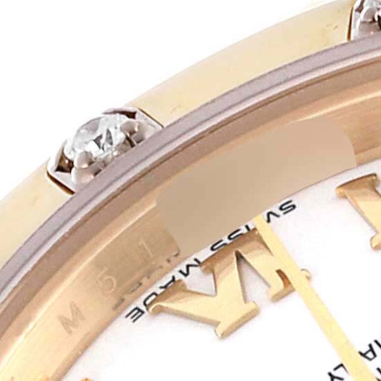The image shows a close-up of the bezel and part of the dial of a Rolex Pearlmaster 80318 Women's Yellow Gold White Dial 80318 Women's Yellow Gold White Dial watch, highlighting diamonds and Roman numerals.