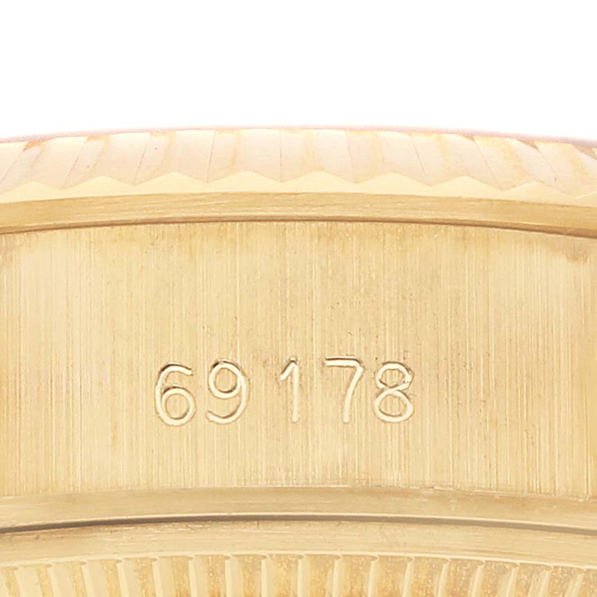 This image shows the side engraving on a Rolex President 69178 Women's Yellow Gold Champagne Dial 69178 Women's Yellow Gold Champagne Dial model, displaying the model number.