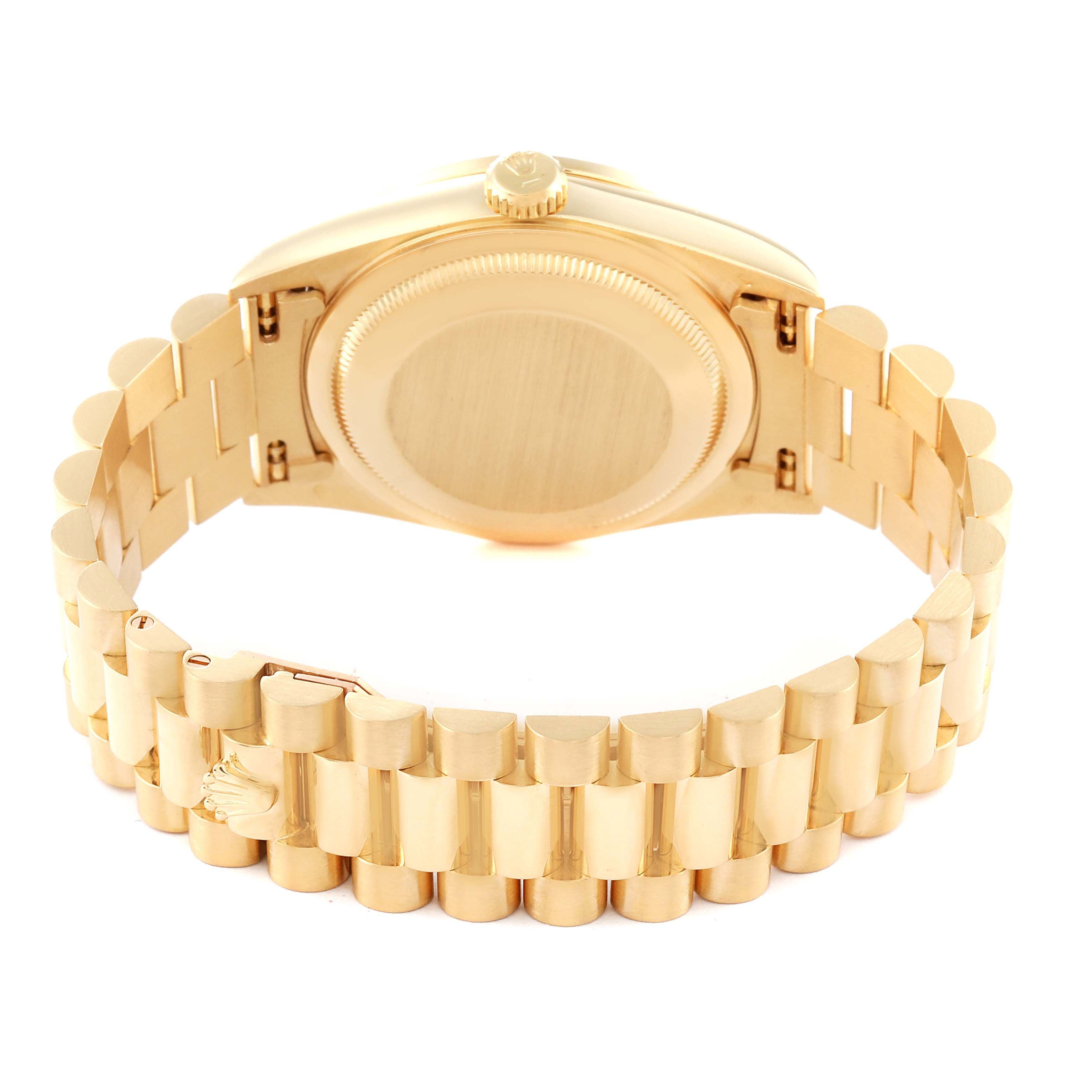 This image shows the back case and gold bracelet of the Rolex President 18348 Men's Yellow Gold Champagne Dial 18348 Men's Yellow Gold Champagne Dial model watch from a rear angle.