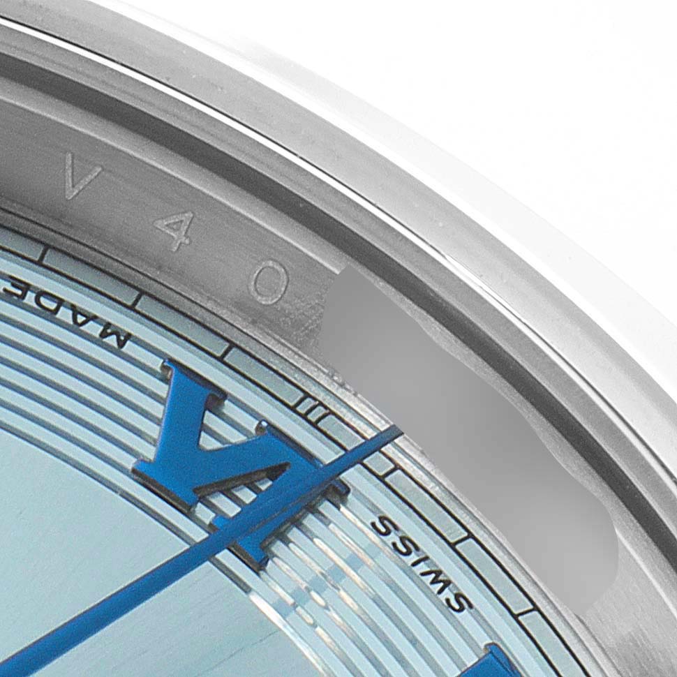 The image shows a close-up of the dial and bezel of a Rolex President 218206 Men's Platinum Blue Dial 218206 Men's Platinum Blue Dial model, highlighting the Roman numeral and "Swiss Made" text.