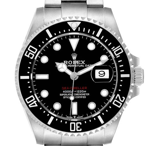 The Rolex Sea-Dweller is shown from a frontal angle, displaying the dial, bezel, case, and part of the bracelet.