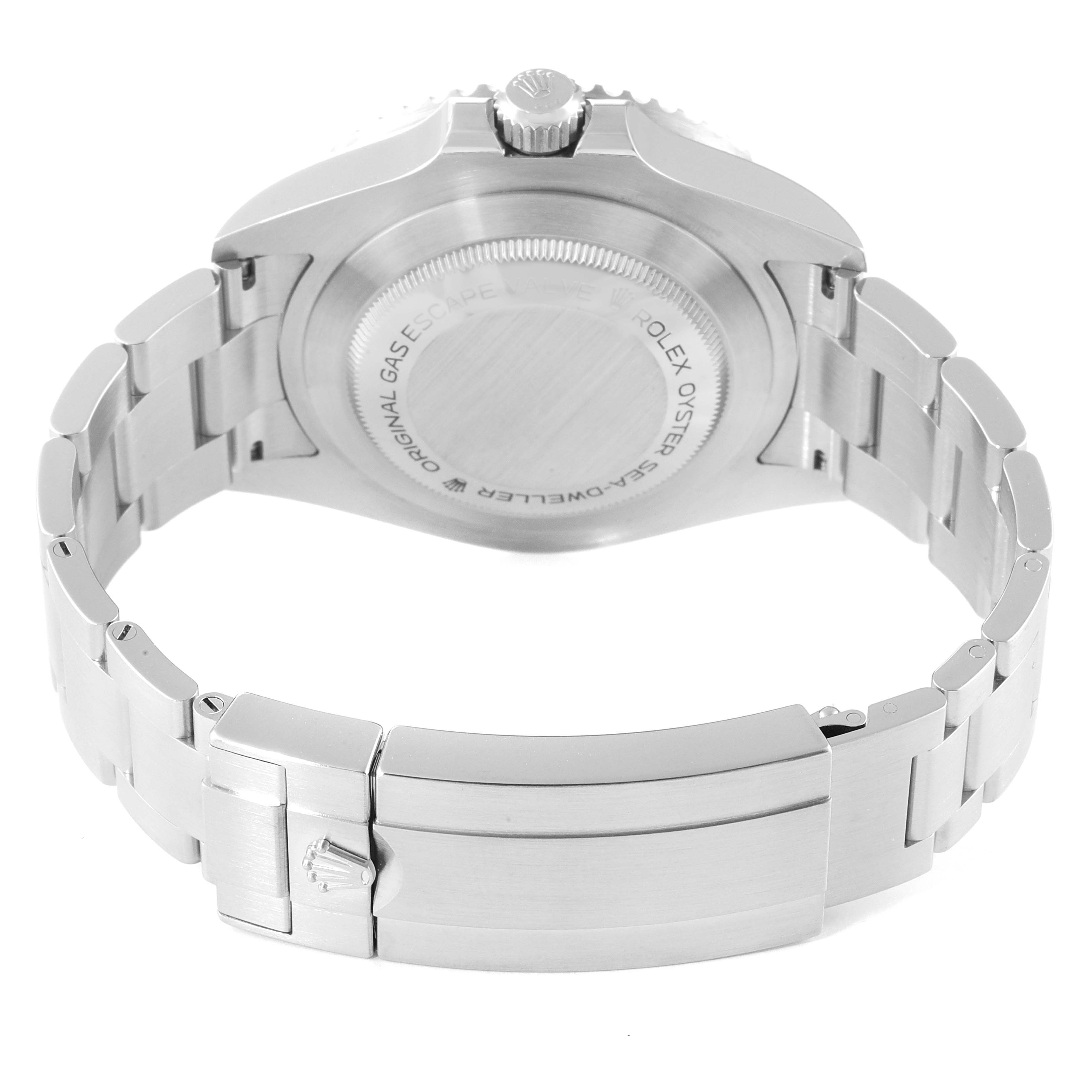 The image shows the back view of a Rolex Sea-Dweller 126600 Men
s Stainless Steel Black Dial 126600 Men
s Stainless Steel Black Dial watch, highlighting its case back and bracelet clasp.