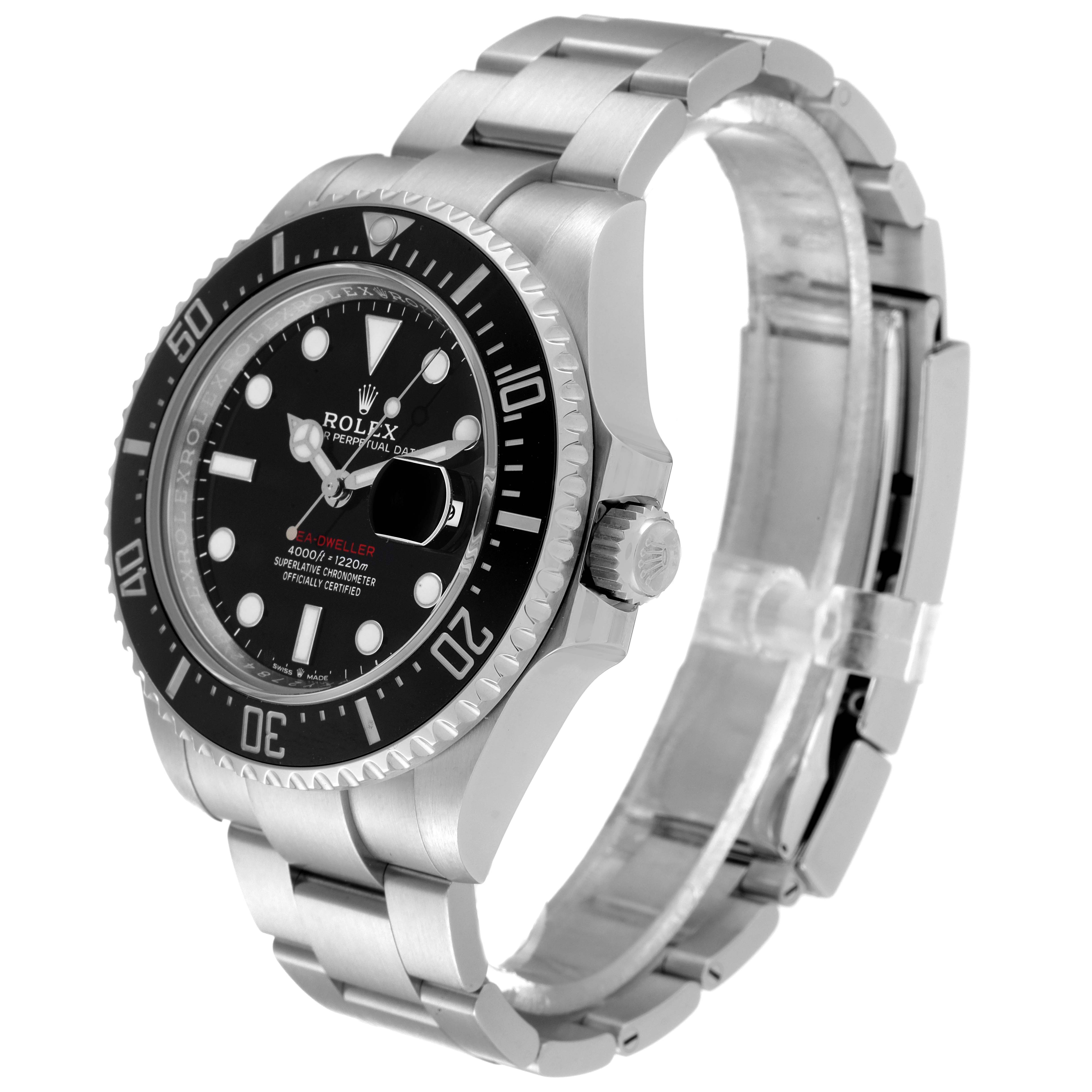 The image shows a Rolex Sea-Dweller 126600 Men
s Stainless Steel Black Dial 126600 Men
s Stainless Steel Black Dial watch from a side angle, highlighting its bezel, crown, and steel bracelet.