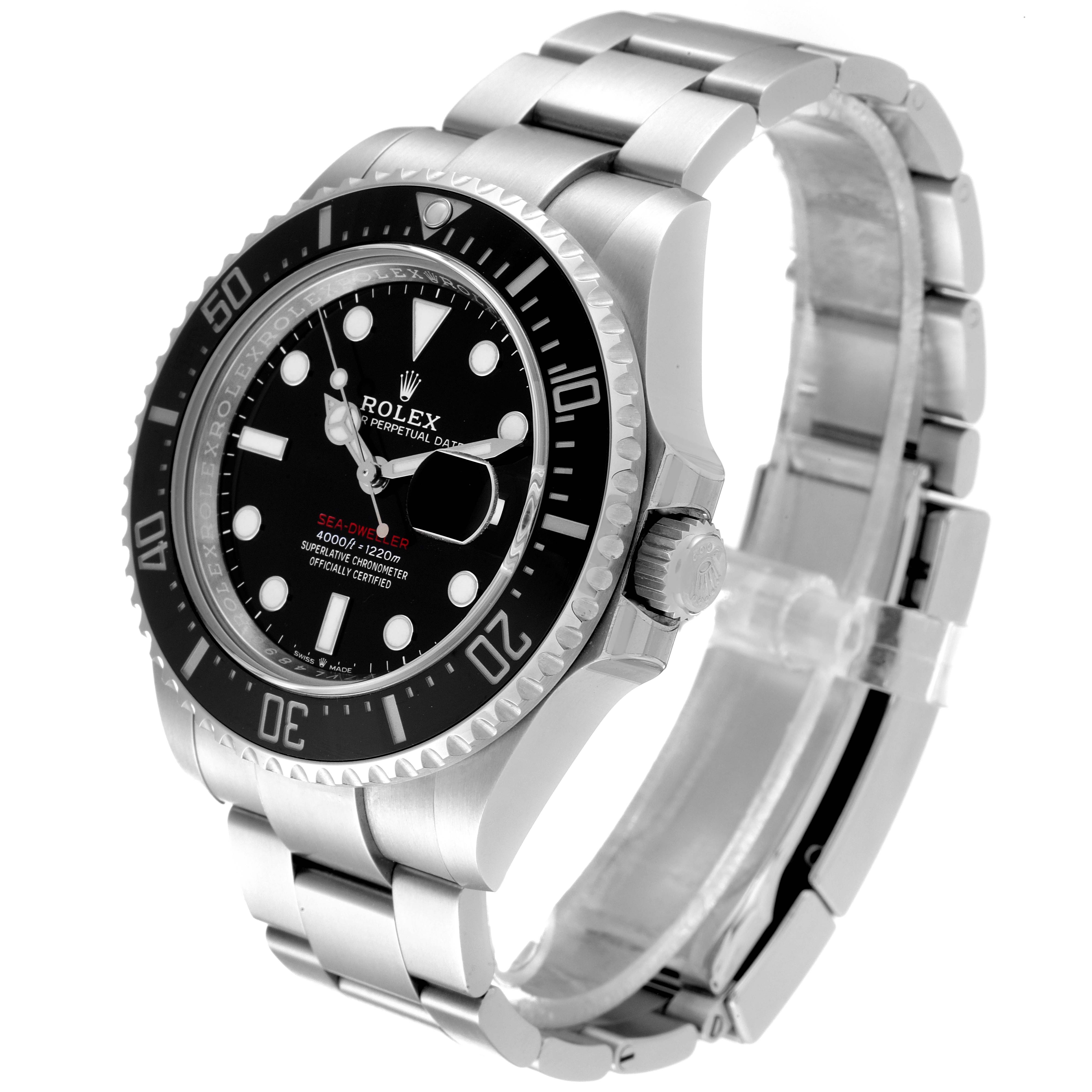 The image shows a Rolex Sea-Dweller 126600 Men
s Stainless Steel Black Dial 126600 Men
s Stainless Steel Black Dial watch at an angled side view, highlighting its bracelet, bezel, crown, and dial.