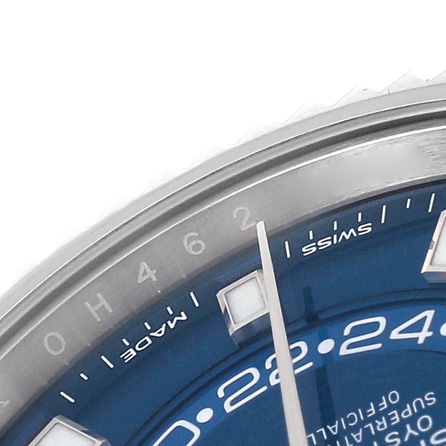 The image shows a close-up of the dial and bezel of a Rolex Sky-Dweller 326934 Men's Stainless Steel Blue Dial 326934 Men's Stainless Steel Blue Dial watch, highlighting the "SWISS MADE" text and partial hour markers.