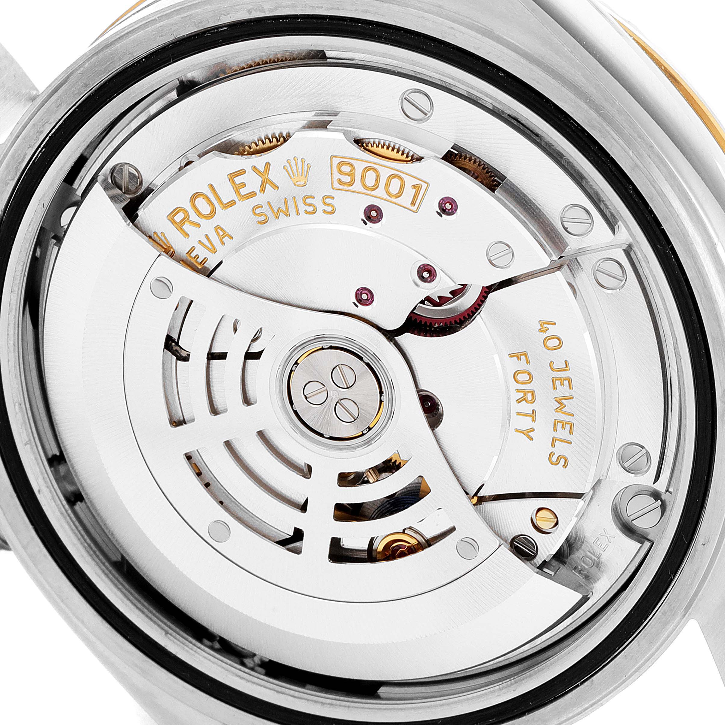 The image shows a close-up of the movement mechanism of the Rolex Sky-Dweller 326933 Men's Steel and Gold (two tone) Champagne Dial 326933 Men's Steel and Gold (two tone) Champagne Dial watch, highlighting the 40-jewel automatic movement.