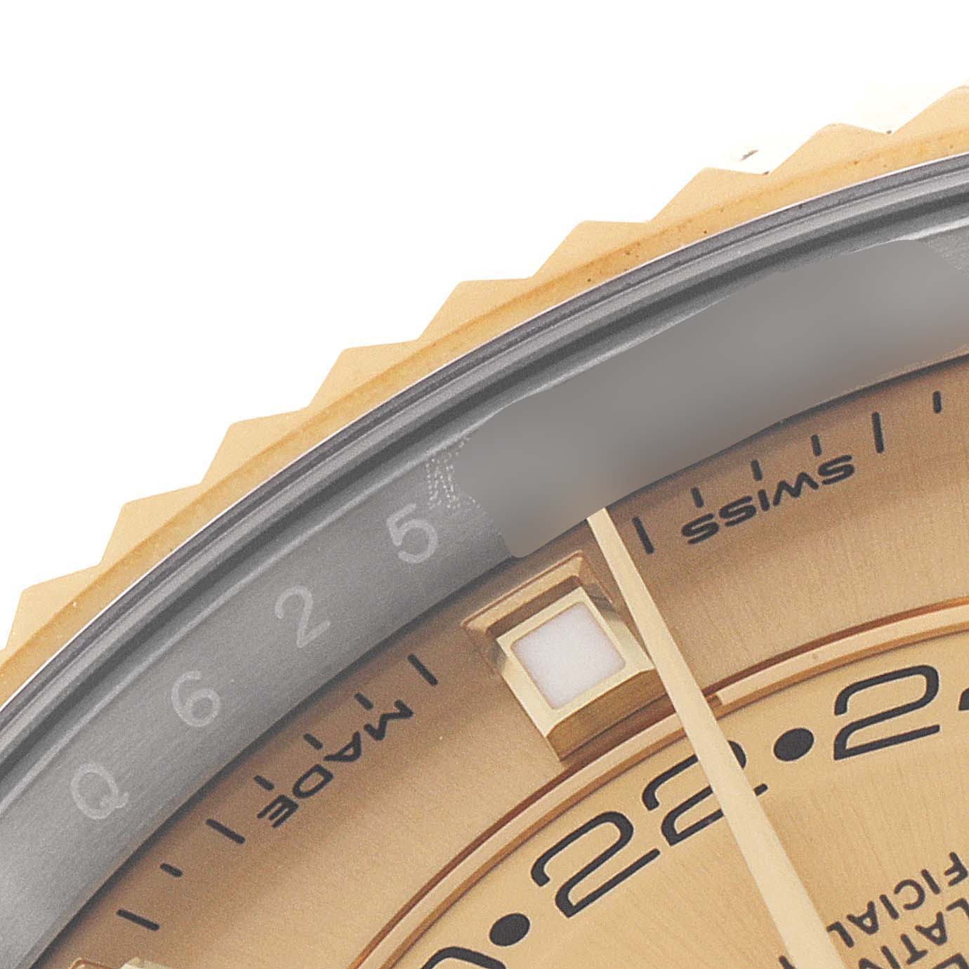 The image shows a close-up of the dial and bezel of a Rolex Sky-Dweller 326933 Men's Steel and Gold (two tone) Champagne Dial 326933 Men's Steel and Gold (two tone) Champagne Dial watch.
