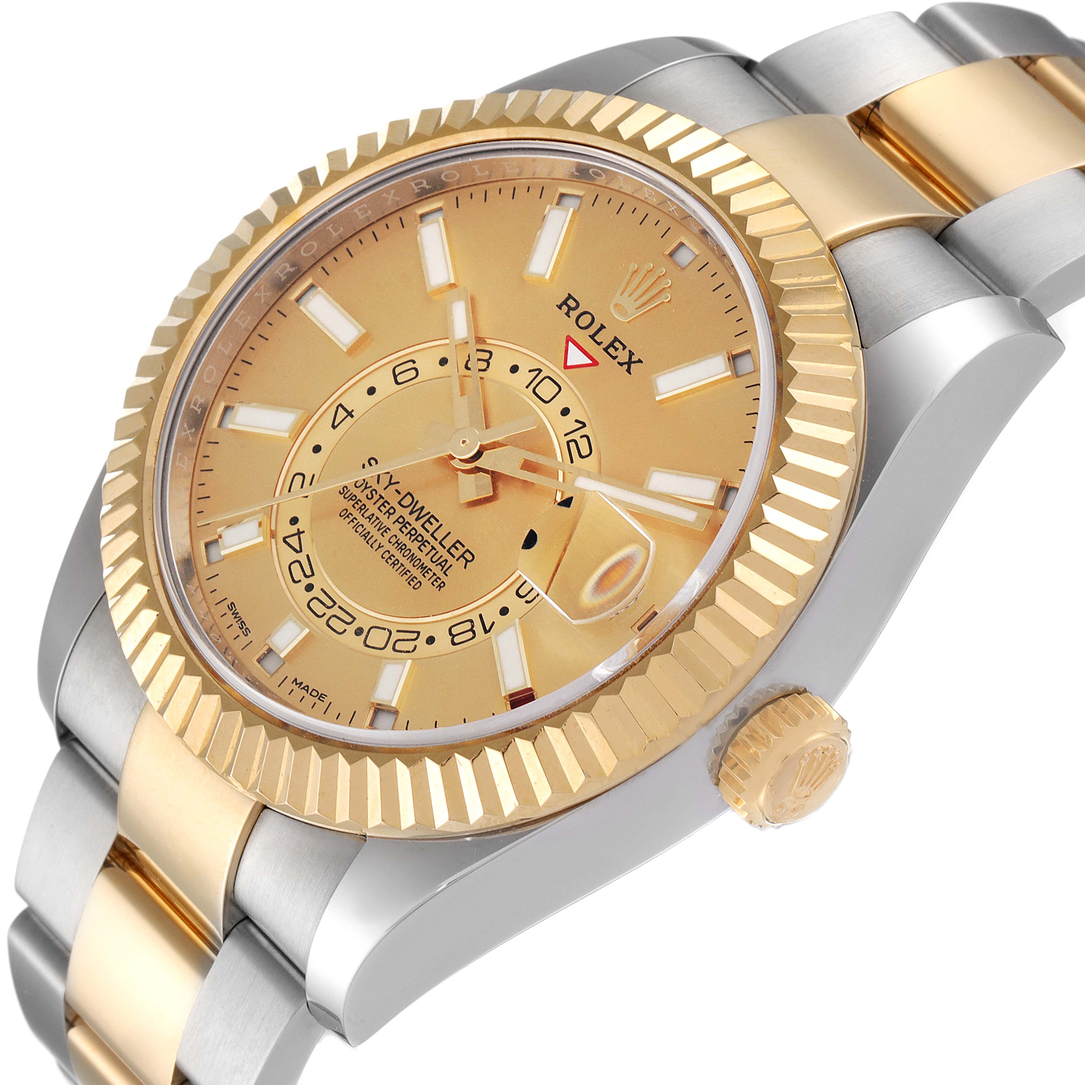 The image shows a close-up angle of the Rolex Sky-Dweller 326933 Men's Steel and Gold (two tone) Champagne Dial 326933 Men's Steel and Gold (two tone) Champagne Dial watch, highlighting its face, bezel, crown, and part of the bracelet.