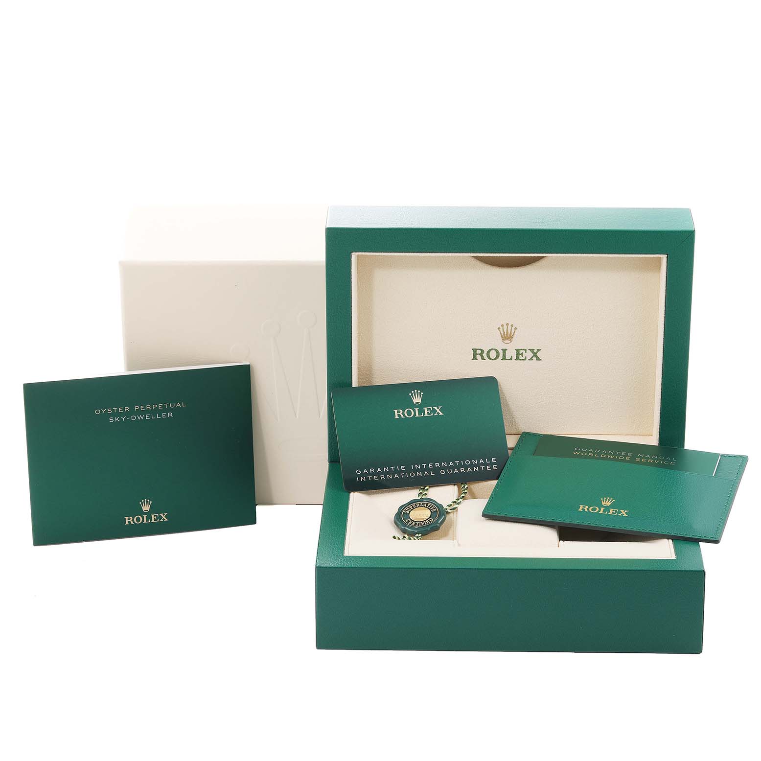 The image shows a Rolex Sky-Dweller 326933 Men's Steel and Gold (two tone) White Dial 326933 Men's Steel and Gold (two tone) White Dial watch partially visible in its open box, along with manuals, booklets, and a warranty card.