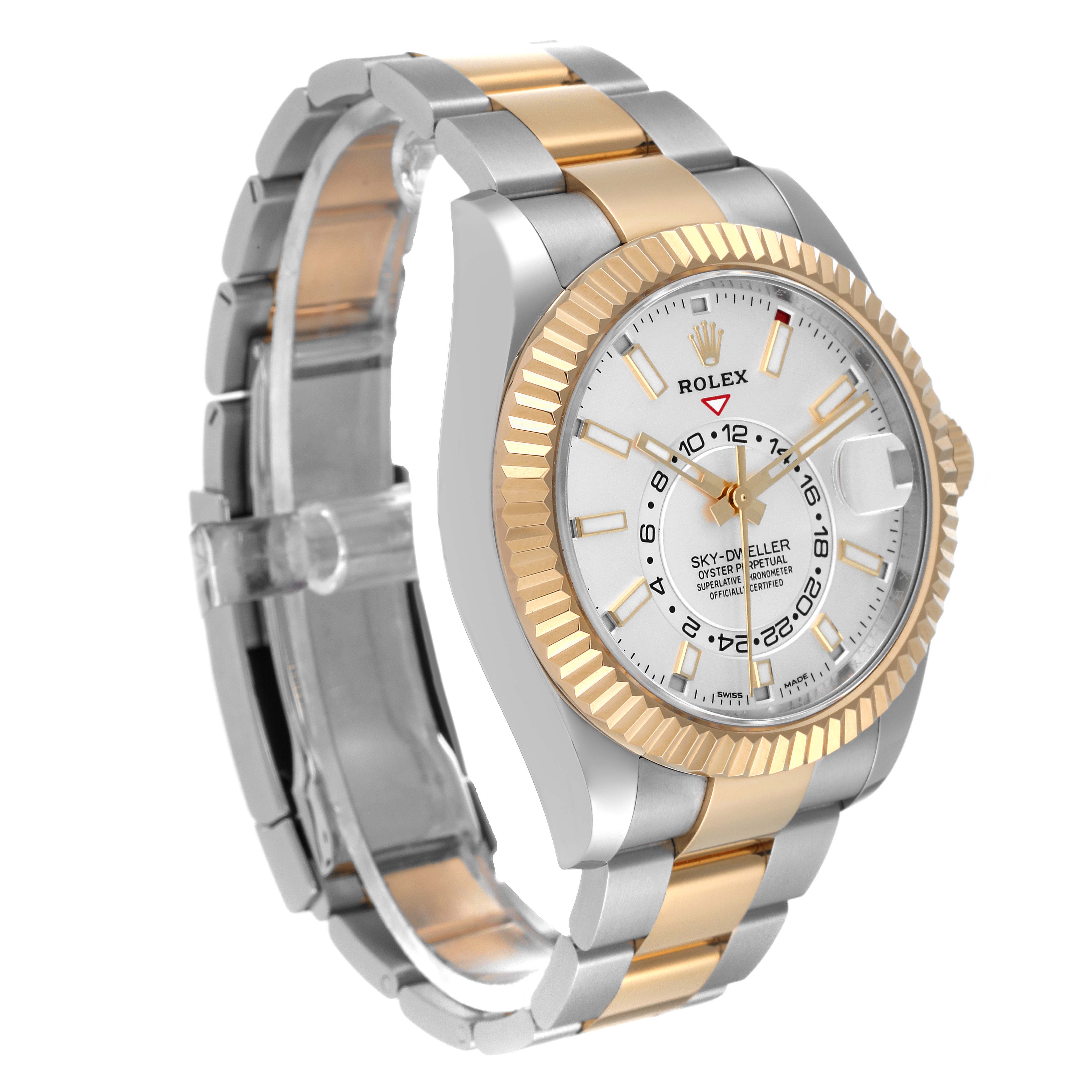 This Sky-Dweller model by Rolex is shown at a three-quarter angle, highlighting its two-tone bracelet, fluted bezel, and dial.