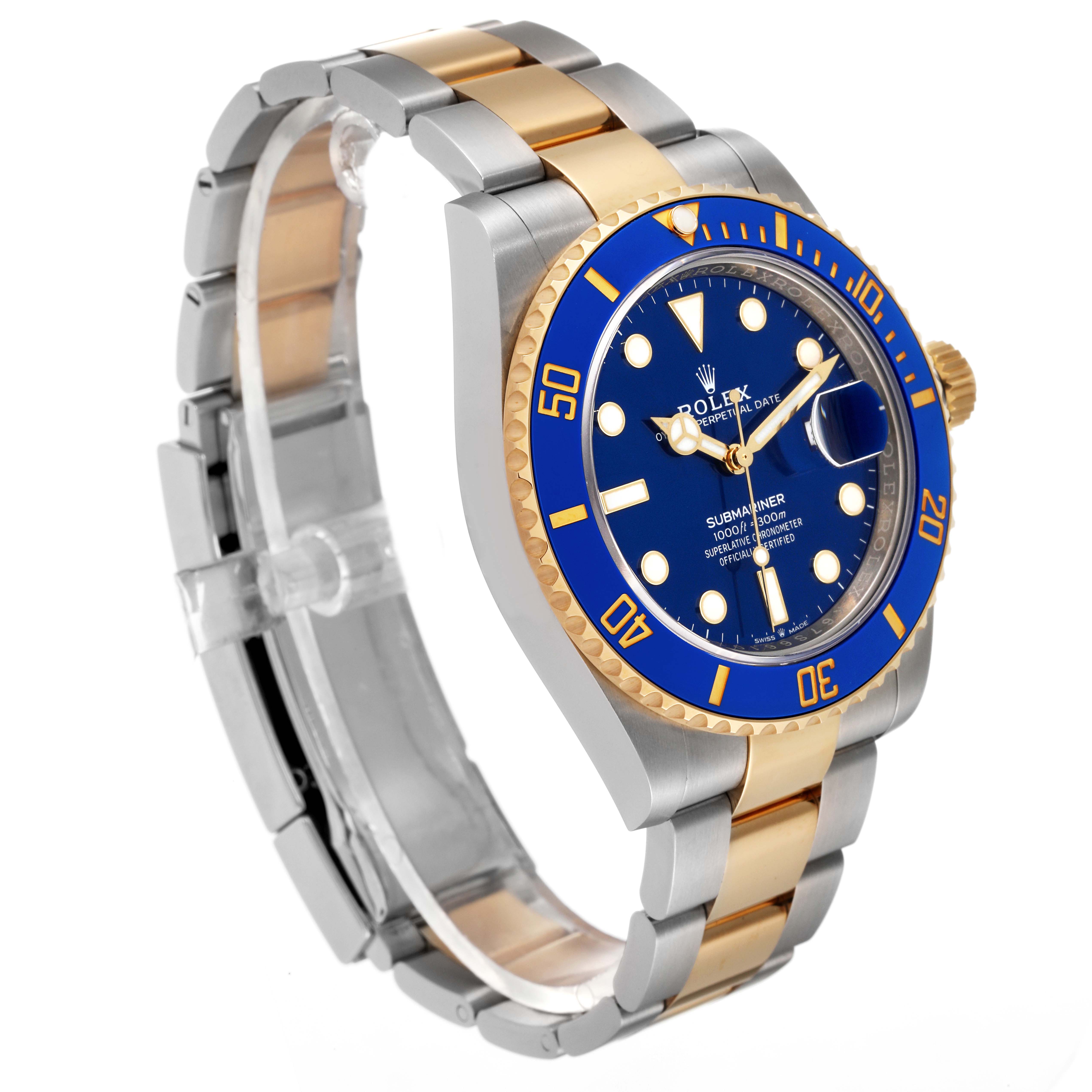 The image shows a Rolex Submariner 126613 Men's Steel and Gold (two tone) Blue Dial 126613 Men's Steel and Gold (two tone) Blue Dial watch at a three-quarter angle, displaying its blue dial, bezel, and two-tone metal band.